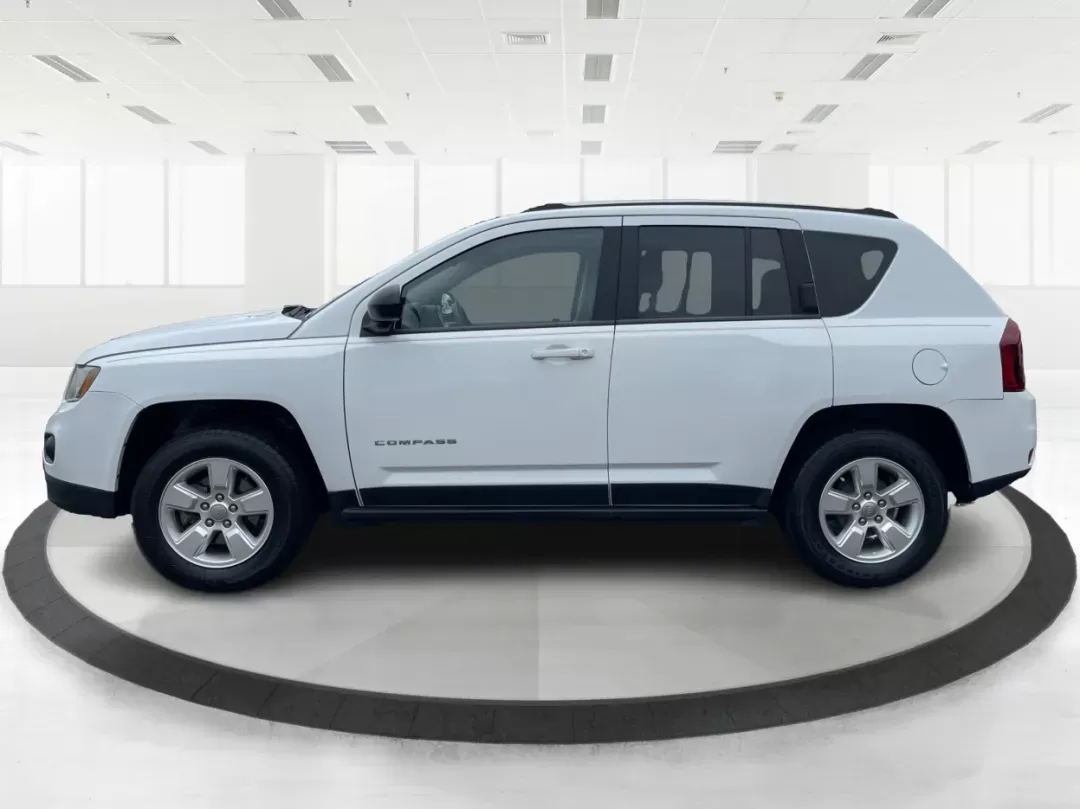 2014 Bright White Clearcoat Jeep Compass Sport FWD (1C4NJCBA9ED) with an 2.0L L4 DOHC 16V engine, located at 880 E. National Road, Vandalia, OH, 45377, (937) 908-9800, 39.891918, -84.183594 - 2014 Jeep Compass Sport FWD - Photo#5