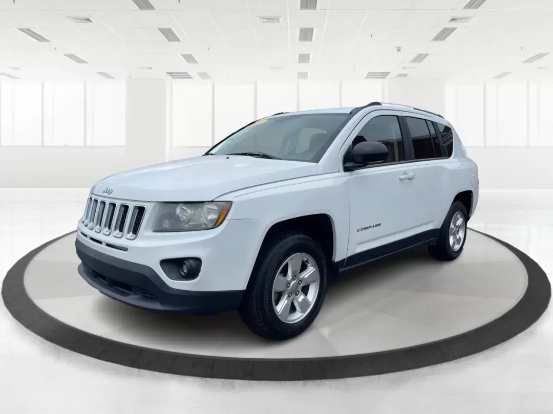 2014 Bright White Clearcoat Jeep Compass Sport FWD (1C4NJCBA9ED) with an 2.0L L4 DOHC 16V engine, located at 880 E. National Road, Vandalia, OH, 45377, (937) 908-9800, 39.891918, -84.183594 - 2014 Jeep Compass Sport FWD - Photo#7