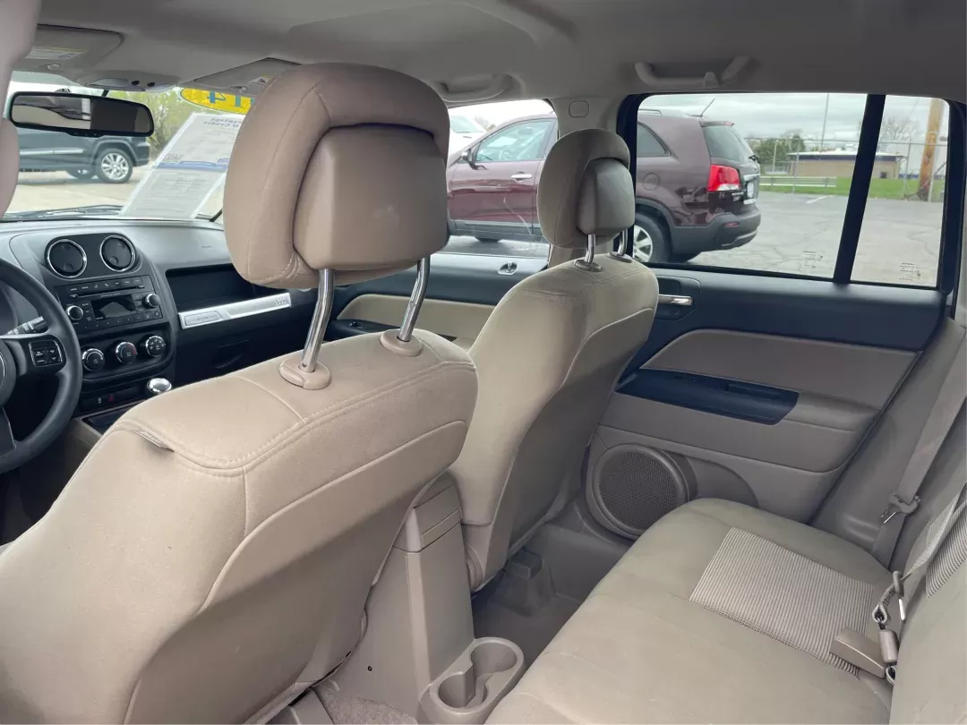 2014 Bright White Clearcoat Jeep Compass Sport FWD (1C4NJCBA9ED) with an 2.0L L4 DOHC 16V engine, located at 880 E. National Road, Vandalia, OH, 45377, (937) 908-9800, 39.891918, -84.183594 - 2014 Jeep Compass Sport FWD - Photo#9