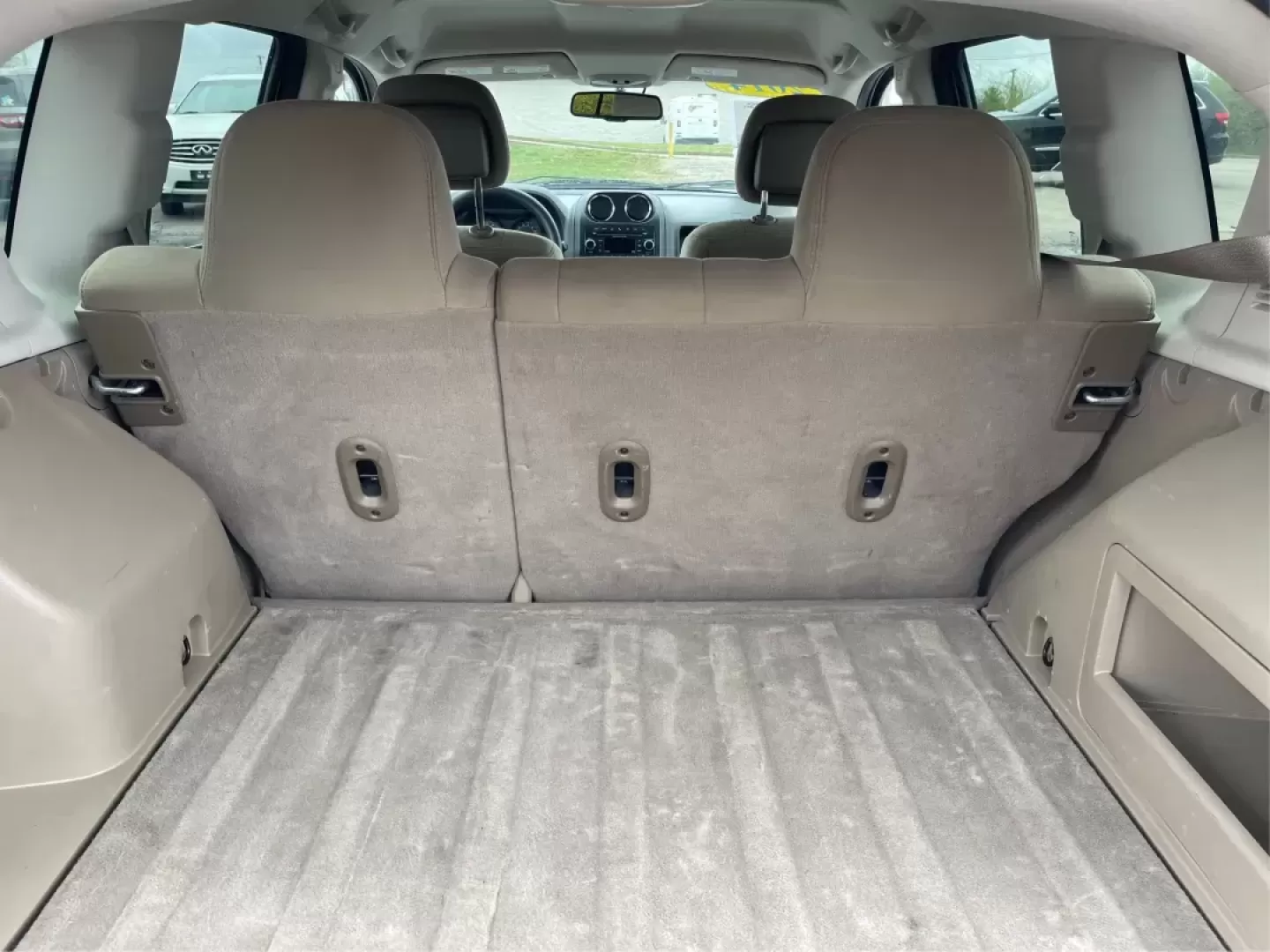 2014 Bright White Clearcoat Jeep Compass Sport FWD (1C4NJCBA9ED) with an 2.0L L4 DOHC 16V engine, located at 880 E. National Road, Vandalia, OH, 45377, (937) 908-9800, 39.891918, -84.183594 - 2014 Jeep Compass Sport FWD - Photo#10