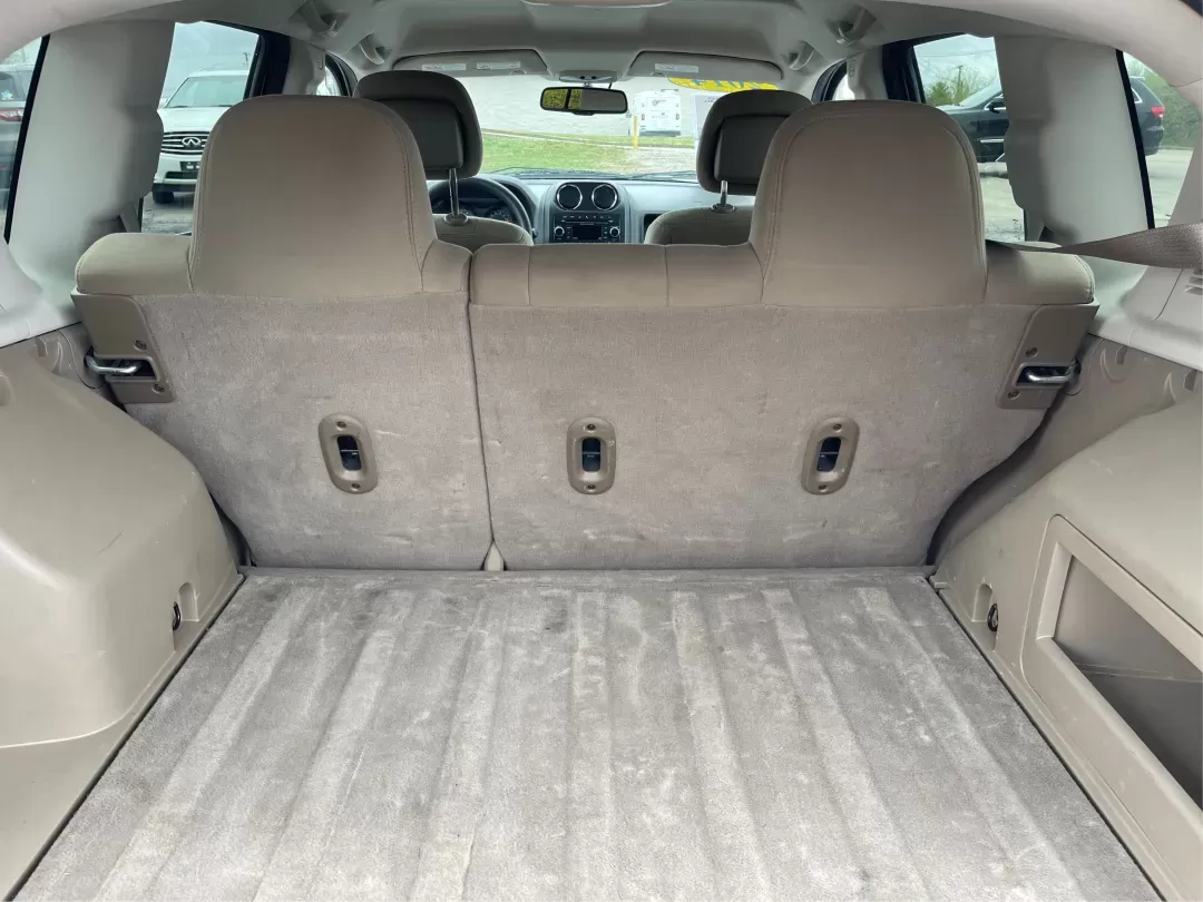 2014 Bright White Clearcoat Jeep Compass Sport FWD (1C4NJCBA9ED) with an 2.0L L4 DOHC 16V engine, located at 880 E. National Road, Vandalia, OH, 45377, (937) 908-9800, 39.891918, -84.183594 - 2014 Jeep Compass Sport FWD - Photo#10