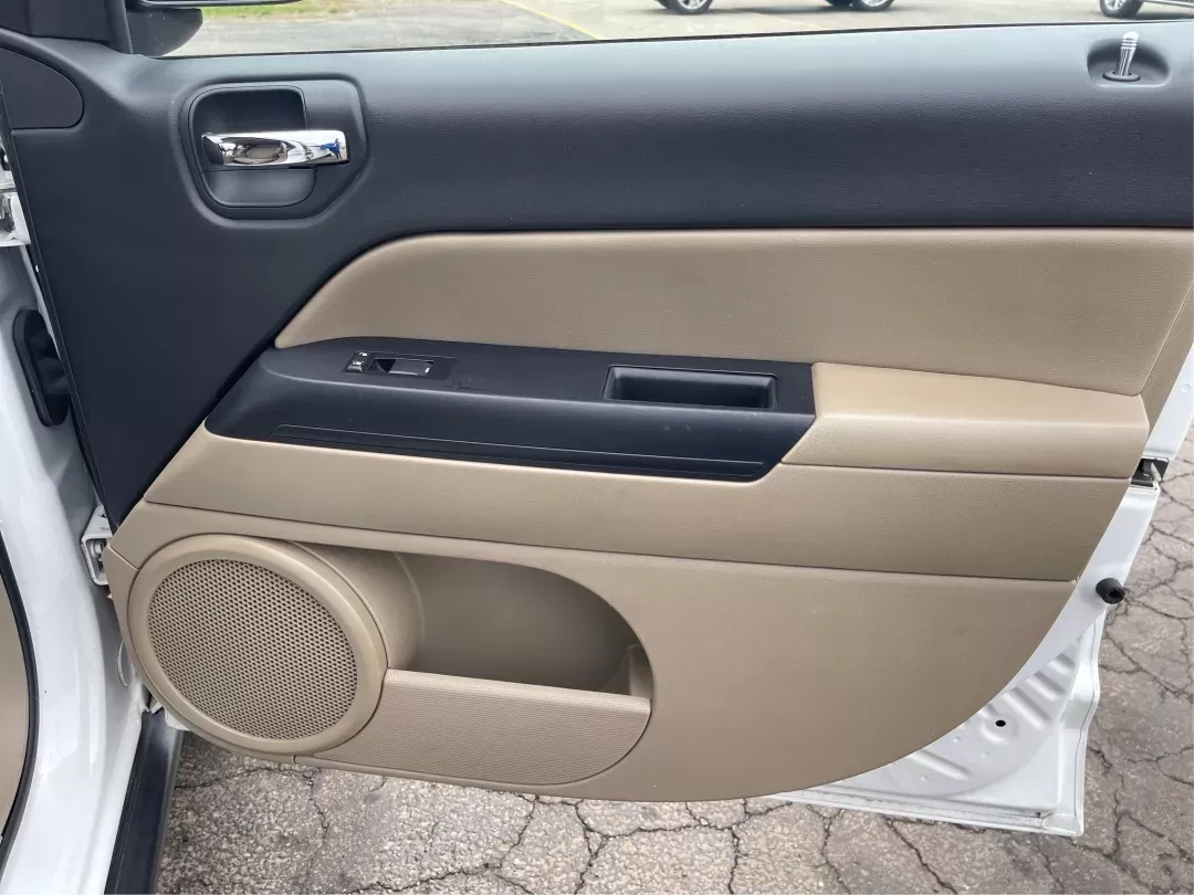 2014 Bright White Clearcoat Jeep Compass Sport FWD (1C4NJCBA9ED) with an 2.0L L4 DOHC 16V engine, located at 880 E. National Road, Vandalia, OH, 45377, (937) 908-9800, 39.891918, -84.183594 - 2014 Jeep Compass Sport FWD - Photo#17