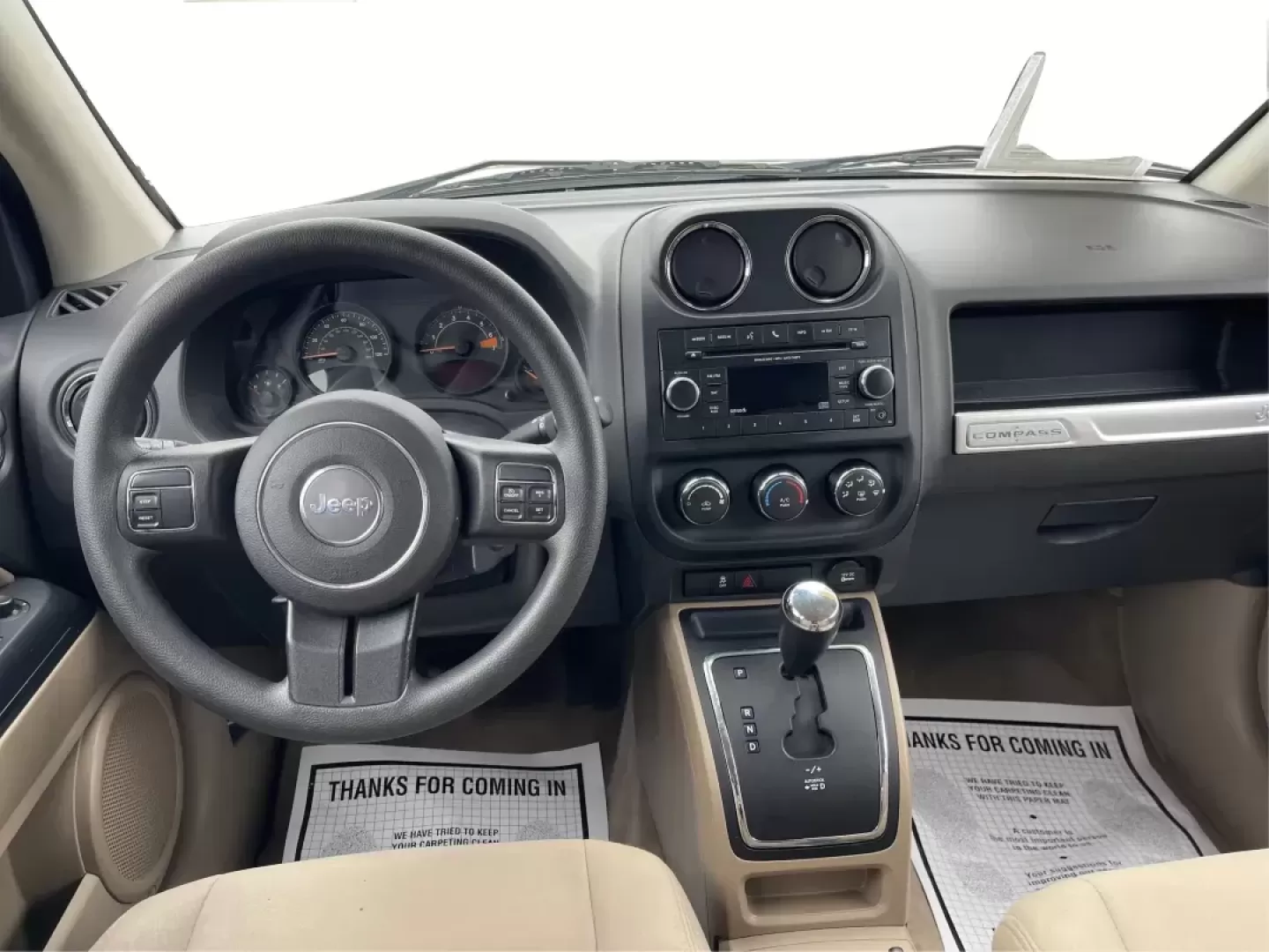 2014 Bright White Clearcoat Jeep Compass Sport FWD (1C4NJCBA9ED) with an 2.0L L4 DOHC 16V engine, located at 880 E. National Road, Vandalia, OH, 45377, (937) 908-9800, 39.891918, -84.183594 - 2014 Jeep Compass Sport FWD - Photo#18