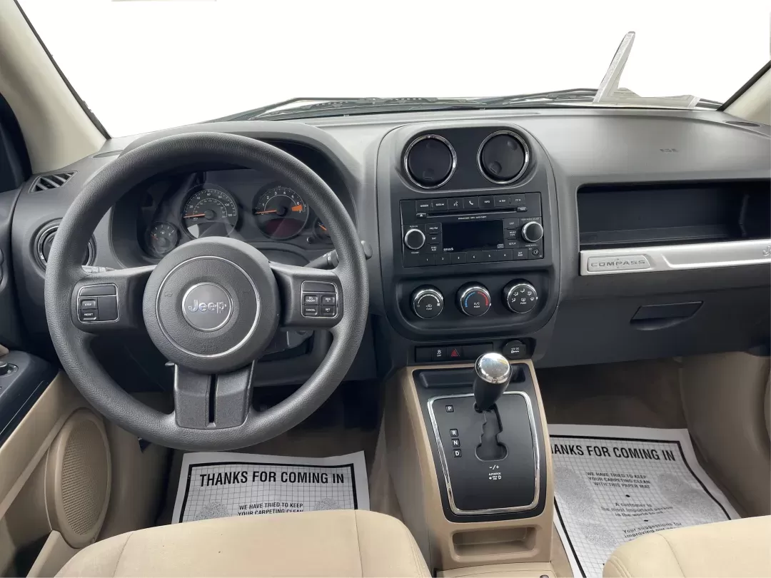 2014 Bright White Clearcoat Jeep Compass Sport FWD (1C4NJCBA9ED) with an 2.0L L4 DOHC 16V engine, located at 880 E. National Road, Vandalia, OH, 45377, (937) 908-9800, 39.891918, -84.183594 - 2014 Jeep Compass Sport FWD - Photo#18