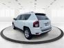 2014 Bright White Clearcoat Jeep Compass Sport FWD (1C4NJCBA9ED) with an 2.0L L4 DOHC 16V engine, located at 8750 N County Rd 25A, Piqua, OH, 45356, (937) 908-9800, 40.164391, -84.232513 - 2014 Jeep Compass Sport FWD - Photo#4