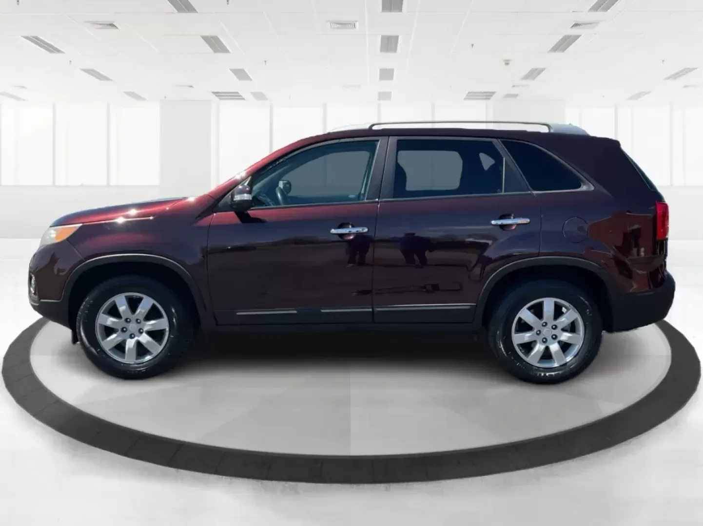 2011 Dark Cherry Kia Sorento LX 2WD (5XYKT3A14BG) with an 2.4L L4 DOHC 16V engine, 6-Speed Automatic transmission, located at 1230 East Main St, Xenia, OH, 45385, (937) 908-9800, 39.688026, -83.910172 - 2011 Kia Sorento LX 2WD - Photo#5