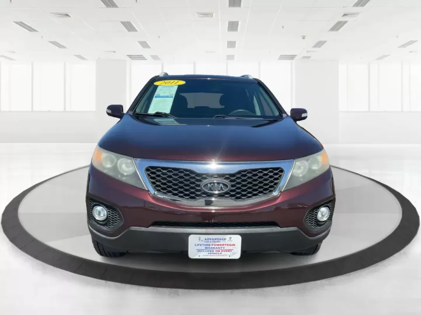 2011 Dark Cherry Kia Sorento LX 2WD (5XYKT3A14BG) with an 2.4L L4 DOHC 16V engine, 6-Speed Automatic transmission, located at 1230 East Main St, Xenia, OH, 45385, (937) 908-9800, 39.688026, -83.910172 - 2011 Kia Sorento LX 2WD - Photo#6