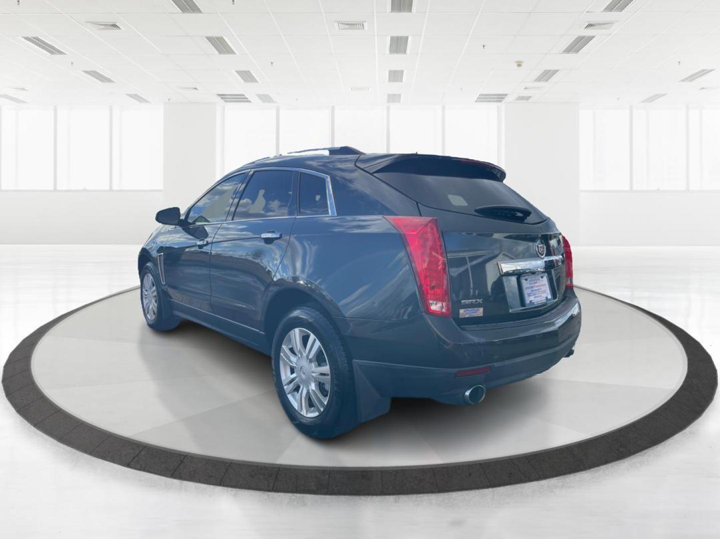 2015 Graphite Metallic Cadillac SRX Luxury Collection FWD (3GYFNBE3XFS) with an 3.6L V6 DOHC 24V FFV engine, 6-Speed Automatic transmission, located at 880 E. National Road, Vandalia, OH, 45377, (937) 908-9800, 39.891918, -84.183594 - 2015 Cadillac SRX Luxury Collection FWD - Photo#4