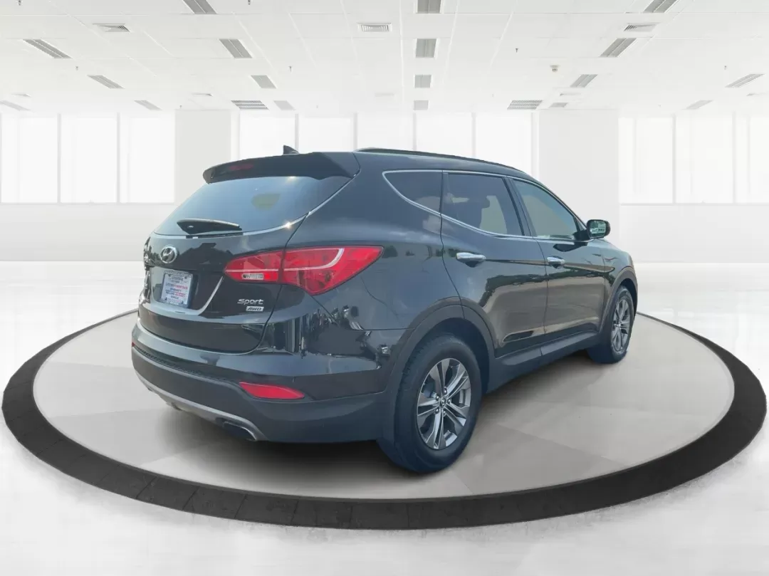 2013 Twilight Black Hyundai Santa Fe Sport 2.4 AWD (5XYZUDLB5DG) with an 2.4L L4 DOHC 16V engine, 6-Speed Automatic transmission, located at 4508 South Dixie Dr, Moraine, OH, 45439, (937) 908-9800, 39.689976, -84.218452 - Photo#2