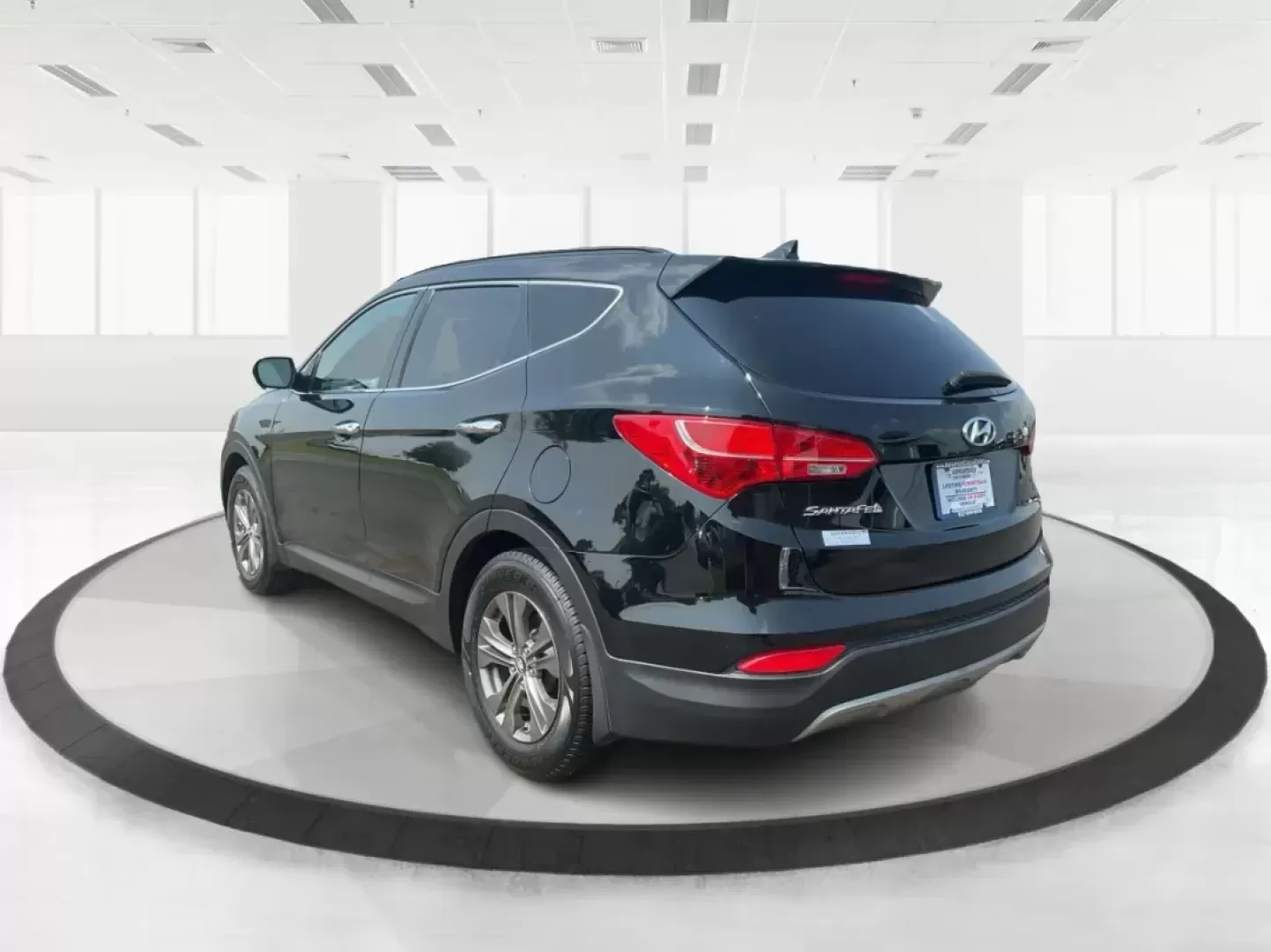 2013 Twilight Black Hyundai Santa Fe Sport 2.4 AWD (5XYZUDLB5DG) with an 2.4L L4 DOHC 16V engine, 6-Speed Automatic transmission, located at 4508 South Dixie Dr, Moraine, OH, 45439, (937) 908-9800, 39.689976, -84.218452 - Photo#4