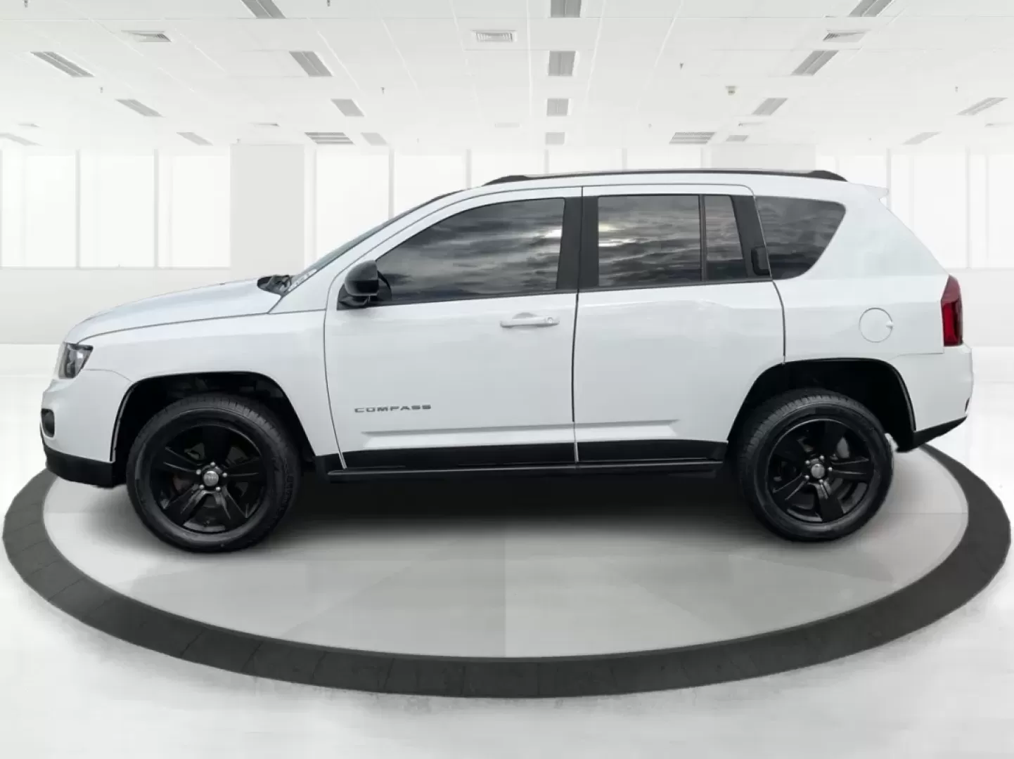 2015 Jeep Compass Sport (1C4NJDBB6FD) with an 2.4L I-4 DOHC engine, located at 880 E. National Road, Vandalia, OH, 45377, (937) 908-9800, 39.891918, -84.183594 - **Explore Adventure and Comfort with the 2015 Jeep Compass Sport at Advantage Car and Credit!**<br /> <br /> Whether you're navigating your daily commute or embarking on a weekend getaway, the 2015 Jeep Compass Sport is designed with versatility in mind. With a spacious interior and rugged capabilit - Photo#5
