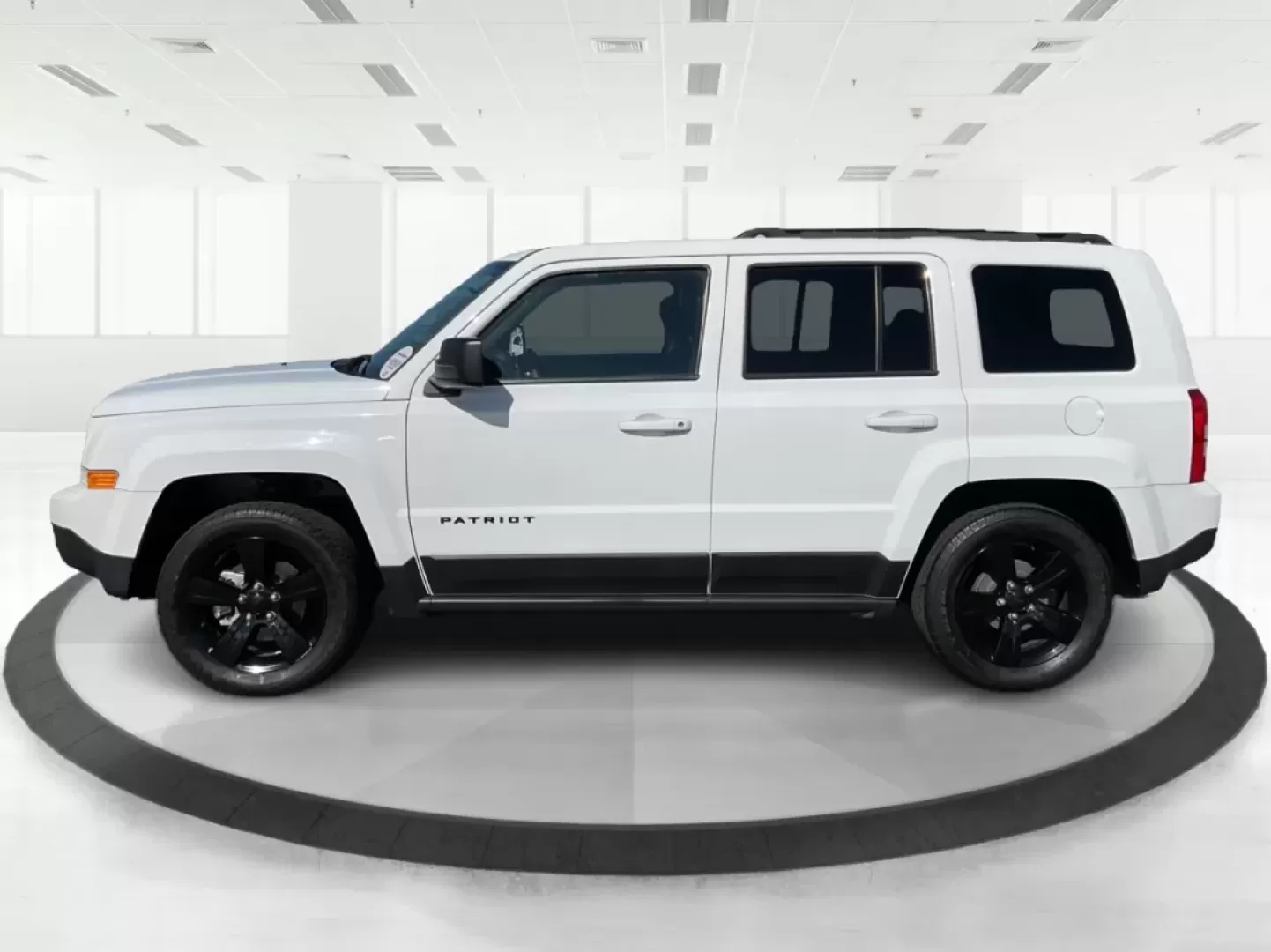2015 Jeep Patriot Altitude Edition (1C4NJPBA1FD) with an 2L I-4 DOHC engine, located at 880 E. National Road, Vandalia, OH, 45377, (937) 908-9800, 39.891918, -84.183594 - Are you ready to elevate your adventures and embrace a life filled with excitement? If you're a weekend wanderer or a growing family looking for a reliable SUV, the 2015 Jeep Patriot Altitude Edition at Advantage Car and Credit is here to meet your needs. With its spacious interior, rugged design, a - Photo#3