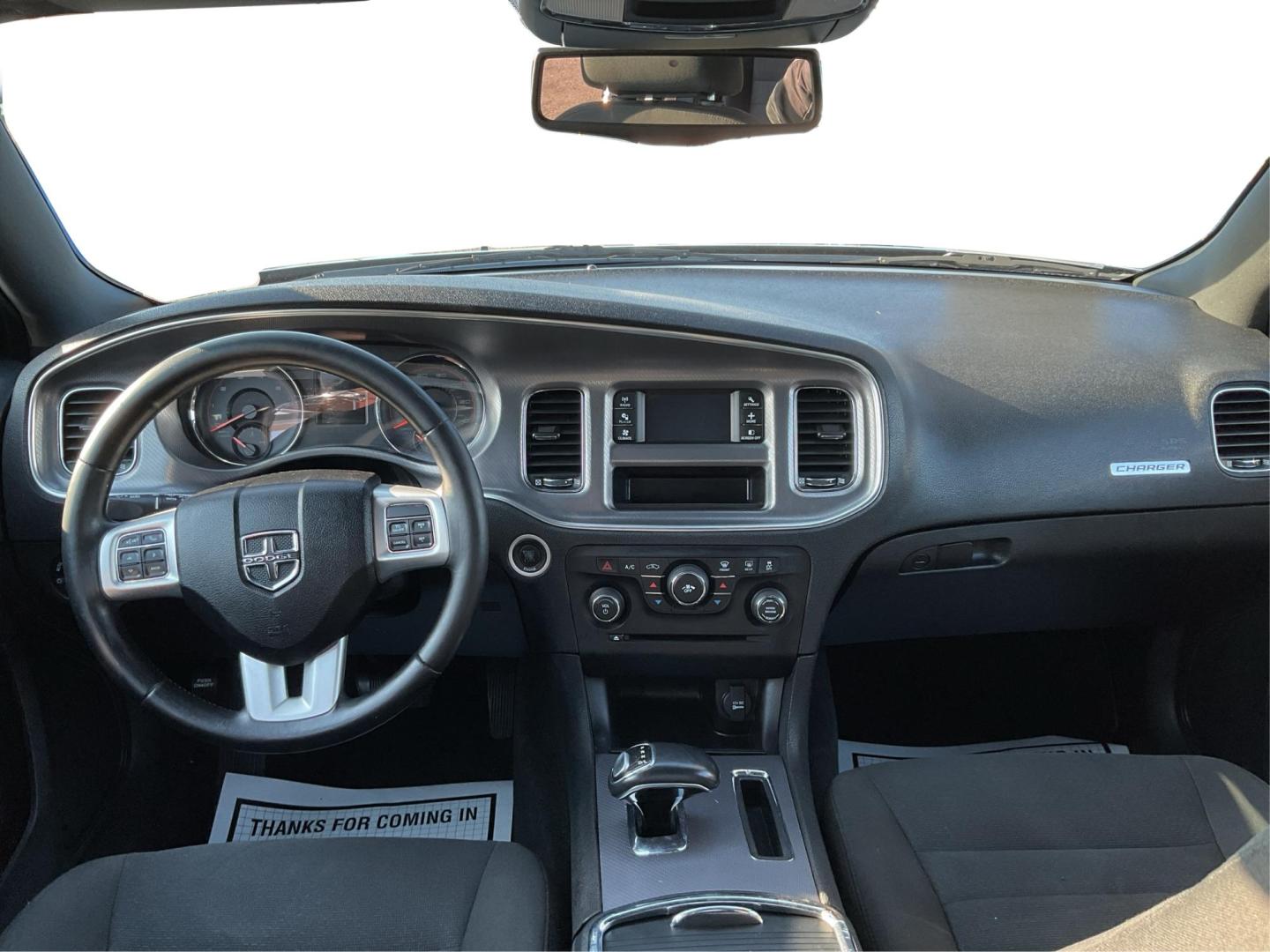 2012 Pitch Black Dodge Charger SE (2C3CDXBGXCH) with an 3.6L V6 DOHC 24V engine, 5-Speed Automatic transmission, located at 401 Woodman Dr, Riverside, OH, 45431, (937) 908-9800, 39.760899, -84.123421 - Photo#19