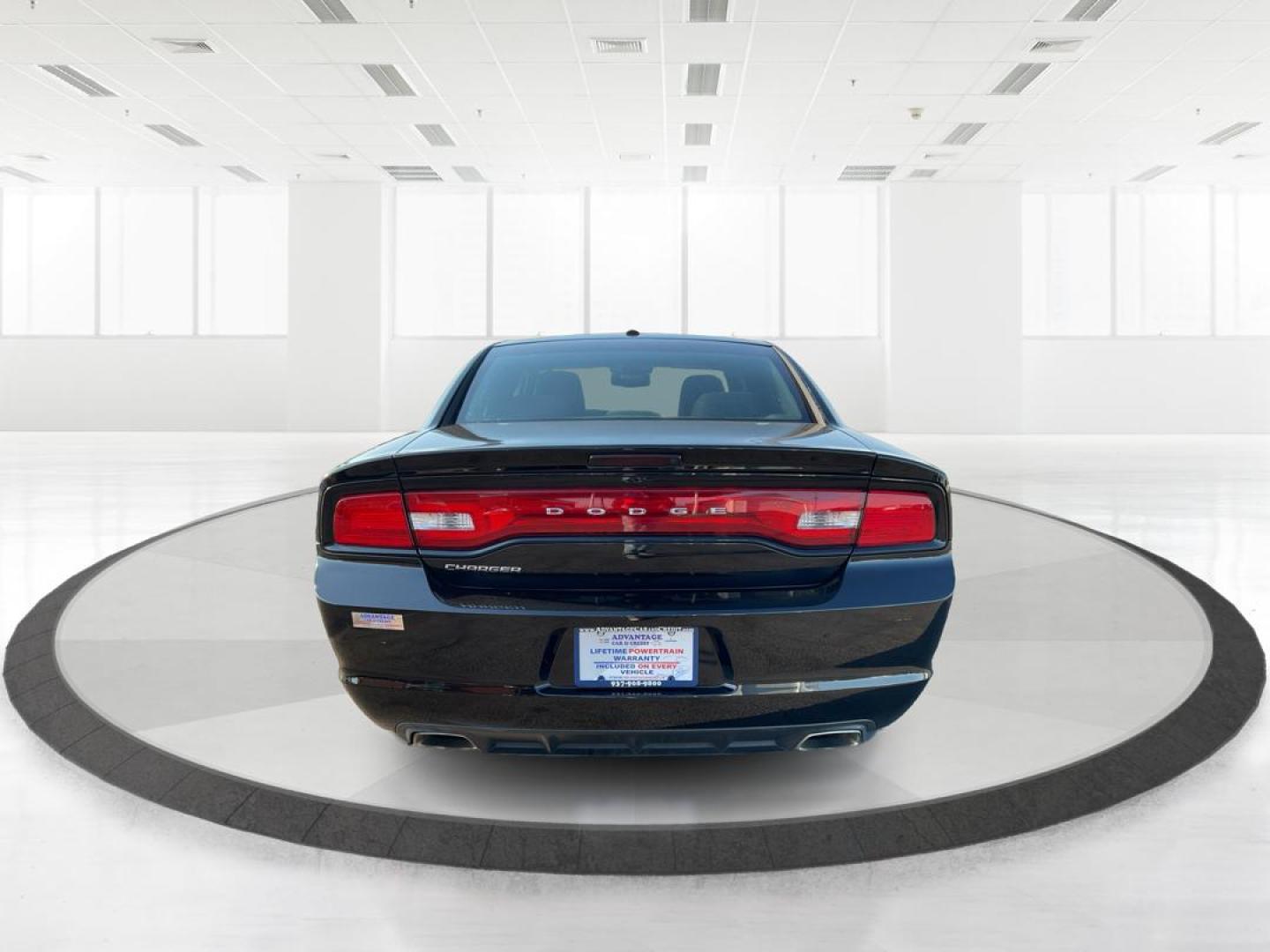 2012 Pitch Black Dodge Charger SE (2C3CDXBGXCH) with an 3.6L V6 DOHC 24V engine, 5-Speed Automatic transmission, located at 401 Woodman Dr, Riverside, OH, 45431, (937) 908-9800, 39.760899, -84.123421 - Photo#3