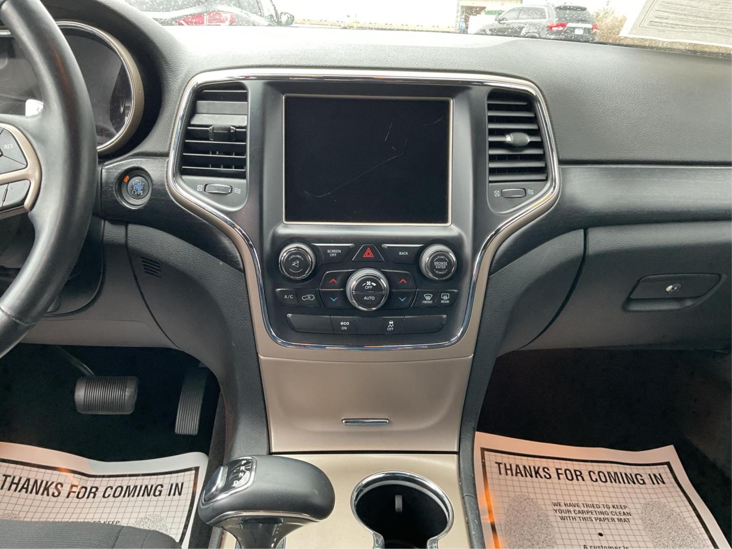 2014 Brilliant Black Crystal P Jeep Grand Cherokee Laredo 4WD (1C4RJFAG5EC) with an 3.6L V6 DOHC 24V engine, 5-Speed Automatic transmission, located at 401 Woodman Dr, Riverside, OH, 45431, (937) 908-9800, 39.760899, -84.123421 - Photo#11