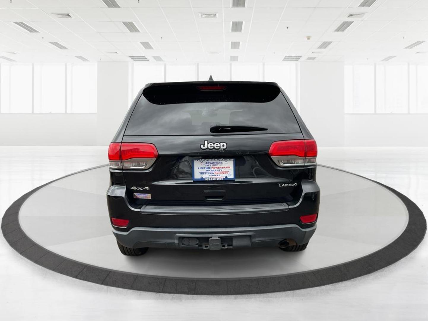 2014 Brilliant Black Crystal P Jeep Grand Cherokee Laredo 4WD (1C4RJFAG5EC) with an 3.6L V6 DOHC 24V engine, 5-Speed Automatic transmission, located at 401 Woodman Dr, Riverside, OH, 45431, (937) 908-9800, 39.760899, -84.123421 - Photo#2