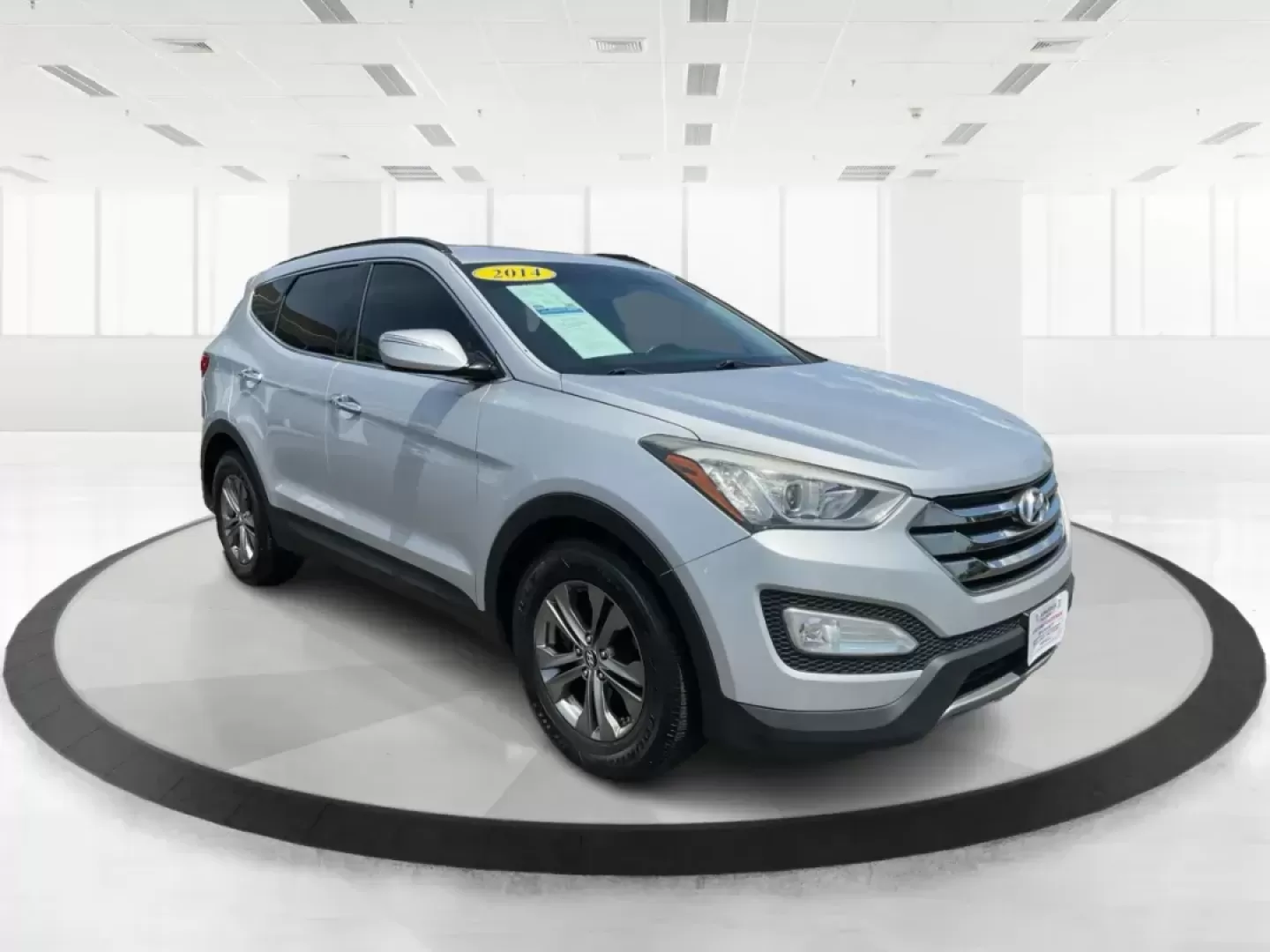 2014 Moonstone Silver Hyundai Santa Fe Sport 2.4 AWD (5XYZUDLB6EG) with an 2.4L L4 DOHC 16V engine, 6-Speed Automatic transmission, located at 8750 N County Rd 25A, Piqua, OH, 45356, (937) 908-9800, 40.164391, -84.232513 - **Adventure Awaits with the 2014 Hyundai Santa Fe Sport 2.4 AWD: Your Perfect Family Companion!** <br /> <br /> Are you searching for a vehicle that seamlessly blends versatility and reliability, ideal for everything from family road trips to daily commutes? Look no further! Advantage Car and Credit - Photo#0