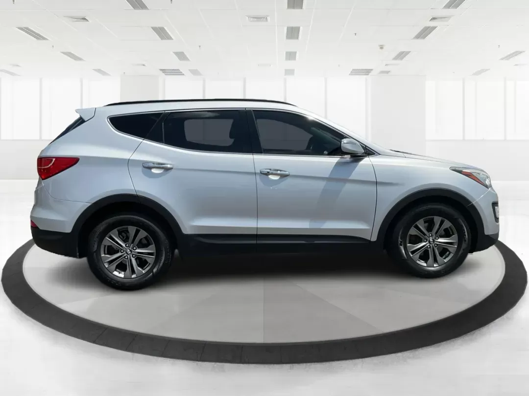 2014 Moonstone Silver Hyundai Santa Fe Sport 2.4 AWD (5XYZUDLB6EG) with an 2.4L L4 DOHC 16V engine, 6-Speed Automatic transmission, located at 8750 N County Rd 25A, Piqua, OH, 45356, (937) 908-9800, 40.164391, -84.232513 - **Adventure Awaits with the 2014 Hyundai Santa Fe Sport 2.4 AWD: Your Perfect Family Companion!** <br /> <br /> Are you searching for a vehicle that seamlessly blends versatility and reliability, ideal for everything from family road trips to daily commutes? Look no further! Advantage Car and Credit - Photo#1