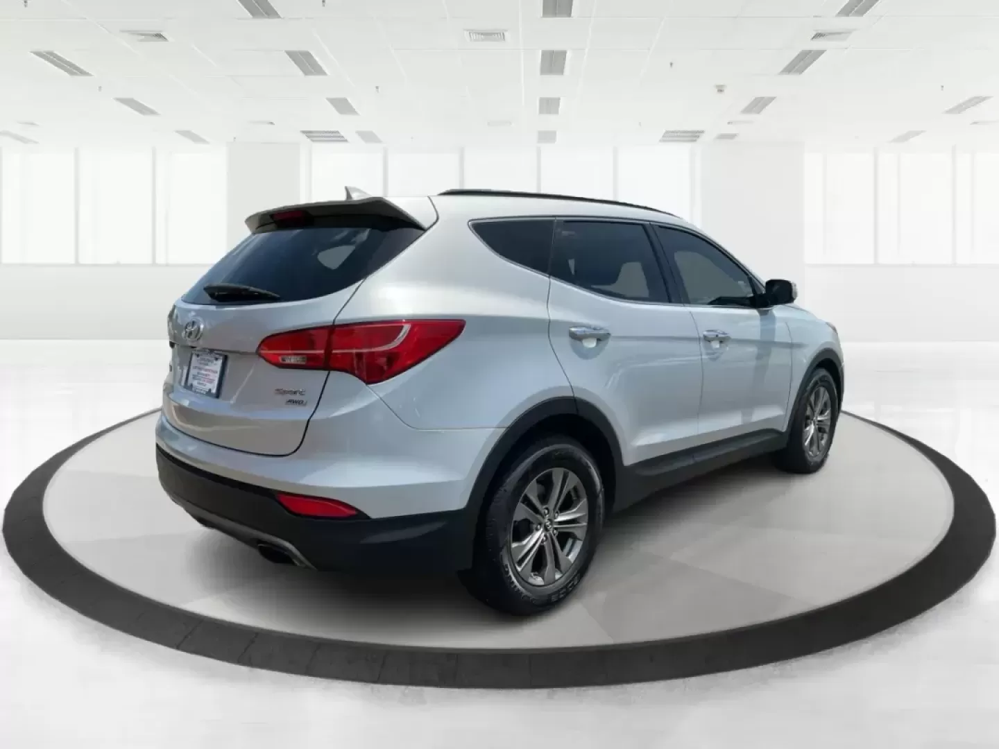 2014 Moonstone Silver Hyundai Santa Fe Sport 2.4 AWD (5XYZUDLB6EG) with an 2.4L L4 DOHC 16V engine, 6-Speed Automatic transmission, located at 8750 N County Rd 25A, Piqua, OH, 45356, (937) 908-9800, 40.164391, -84.232513 - **Adventure Awaits with the 2014 Hyundai Santa Fe Sport 2.4 AWD: Your Perfect Family Companion!** <br /> <br /> Are you searching for a vehicle that seamlessly blends versatility and reliability, ideal for everything from family road trips to daily commutes? Look no further! Advantage Car and Credit - Photo#2