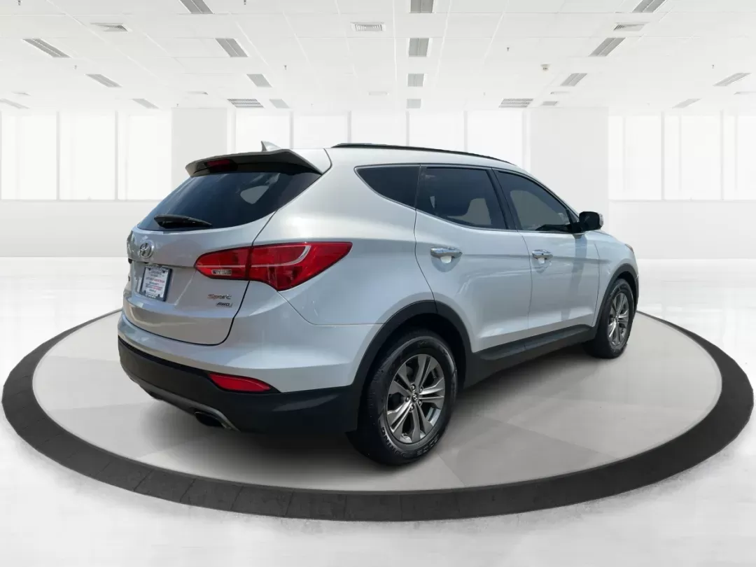 2014 Moonstone Silver Hyundai Santa Fe Sport 2.4 AWD (5XYZUDLB6EG) with an 2.4L L4 DOHC 16V engine, 6-Speed Automatic transmission, located at 8750 N County Rd 25A, Piqua, OH, 45356, (937) 908-9800, 40.164391, -84.232513 - **Adventure Awaits with the 2014 Hyundai Santa Fe Sport 2.4 AWD: Your Perfect Family Companion!** <br /> <br /> Are you searching for a vehicle that seamlessly blends versatility and reliability, ideal for everything from family road trips to daily commutes? Look no further! Advantage Car and Credit - Photo#2