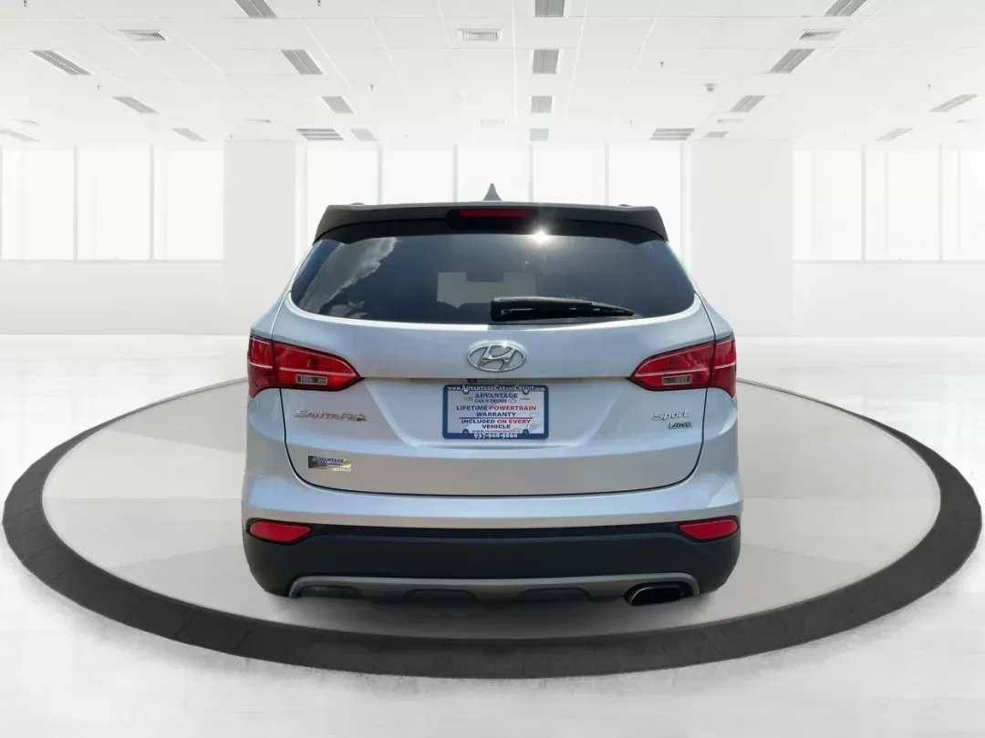2014 Moonstone Silver Hyundai Santa Fe Sport 2.4 AWD (5XYZUDLB6EG) with an 2.4L L4 DOHC 16V engine, 6-Speed Automatic transmission, located at 8750 N County Rd 25A, Piqua, OH, 45356, (937) 908-9800, 40.164391, -84.232513 - **Adventure Awaits with the 2014 Hyundai Santa Fe Sport 2.4 AWD: Your Perfect Family Companion!** <br /> <br /> Are you searching for a vehicle that seamlessly blends versatility and reliability, ideal for everything from family road trips to daily commutes? Look no further! Advantage Car and Credit - Photo#3