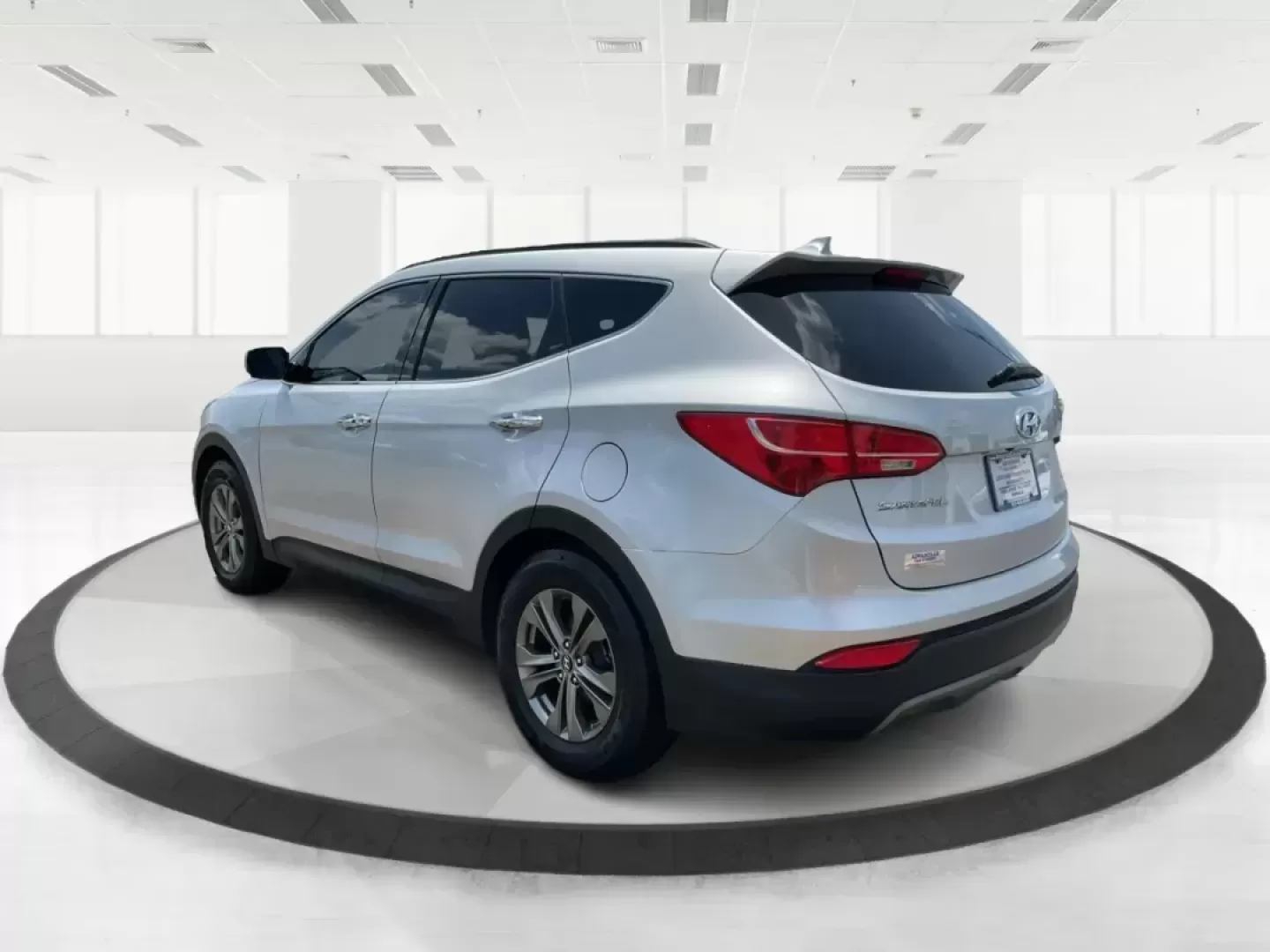 2014 Moonstone Silver Hyundai Santa Fe Sport 2.4 AWD (5XYZUDLB6EG) with an 2.4L L4 DOHC 16V engine, 6-Speed Automatic transmission, located at 8750 N County Rd 25A, Piqua, OH, 45356, (937) 908-9800, 40.164391, -84.232513 - **Adventure Awaits with the 2014 Hyundai Santa Fe Sport 2.4 AWD: Your Perfect Family Companion!** <br /> <br /> Are you searching for a vehicle that seamlessly blends versatility and reliability, ideal for everything from family road trips to daily commutes? Look no further! Advantage Car and Credit - Photo#4