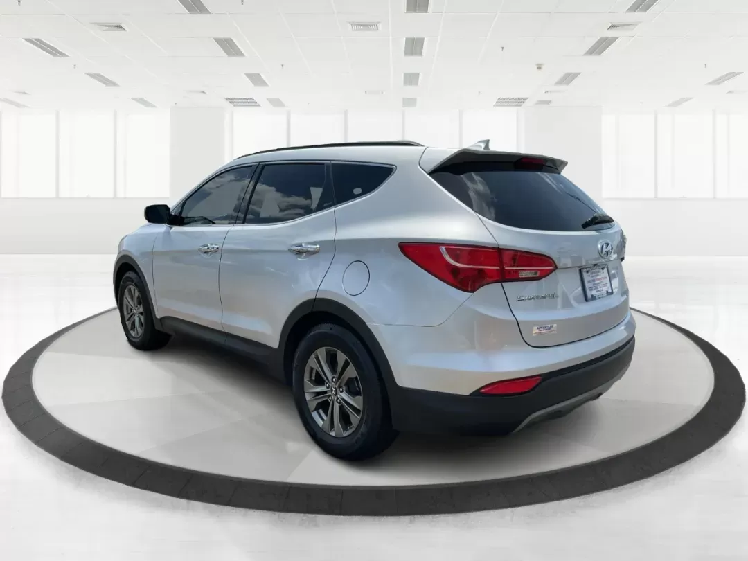 2014 Moonstone Silver Hyundai Santa Fe Sport 2.4 AWD (5XYZUDLB6EG) with an 2.4L L4 DOHC 16V engine, 6-Speed Automatic transmission, located at 8750 N County Rd 25A, Piqua, OH, 45356, (937) 908-9800, 40.164391, -84.232513 - **Adventure Awaits with the 2014 Hyundai Santa Fe Sport 2.4 AWD: Your Perfect Family Companion!** <br /> <br /> Are you searching for a vehicle that seamlessly blends versatility and reliability, ideal for everything from family road trips to daily commutes? Look no further! Advantage Car and Credit - Photo#4
