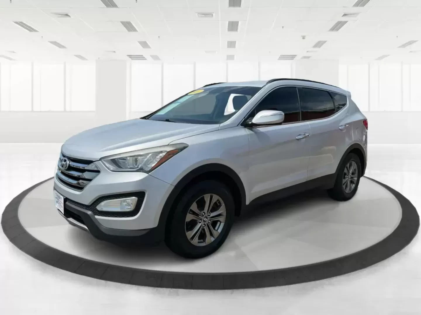 2014 Moonstone Silver Hyundai Santa Fe Sport 2.4 AWD (5XYZUDLB6EG) with an 2.4L L4 DOHC 16V engine, 6-Speed Automatic transmission, located at 8750 N County Rd 25A, Piqua, OH, 45356, (937) 908-9800, 40.164391, -84.232513 - **Adventure Awaits with the 2014 Hyundai Santa Fe Sport 2.4 AWD: Your Perfect Family Companion!** <br /> <br /> Are you searching for a vehicle that seamlessly blends versatility and reliability, ideal for everything from family road trips to daily commutes? Look no further! Advantage Car and Credit - Photo#7