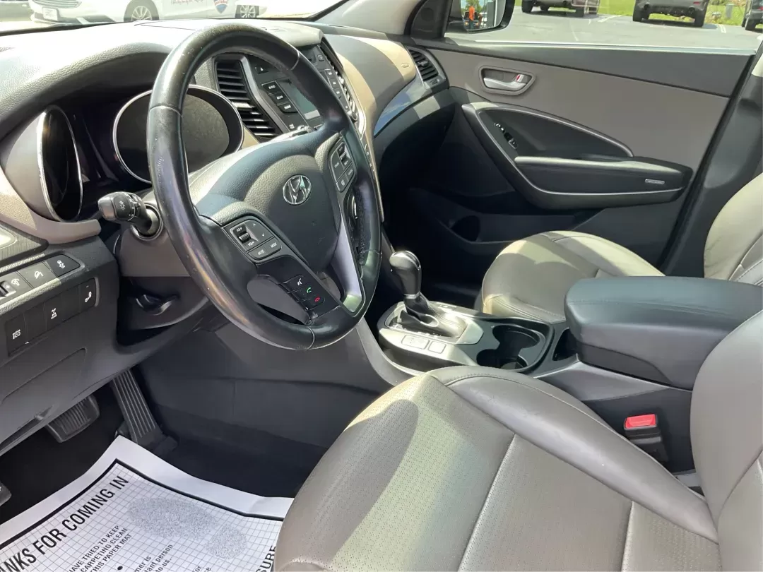 2014 Moonstone Silver Hyundai Santa Fe Sport 2.4 AWD (5XYZUDLB6EG) with an 2.4L L4 DOHC 16V engine, 6-Speed Automatic transmission, located at 8750 N County Rd 25A, Piqua, OH, 45356, (937) 908-9800, 40.164391, -84.232513 - **Adventure Awaits with the 2014 Hyundai Santa Fe Sport 2.4 AWD: Your Perfect Family Companion!** <br /> <br /> Are you searching for a vehicle that seamlessly blends versatility and reliability, ideal for everything from family road trips to daily commutes? Look no further! Advantage Car and Credit - Photo#8