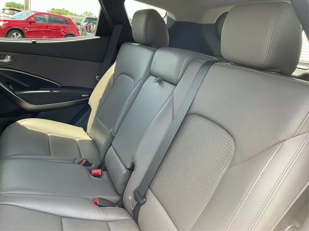 2014 Moonstone Silver Hyundai Santa Fe Sport 2.4 AWD (5XYZUDLB6EG) with an 2.4L L4 DOHC 16V engine, 6-Speed Automatic transmission, located at 8750 N County Rd 25A, Piqua, OH, 45356, (937) 908-9800, 40.164391, -84.232513 - **Adventure Awaits with the 2014 Hyundai Santa Fe Sport 2.4 AWD: Your Perfect Family Companion!** <br /> <br /> Are you searching for a vehicle that seamlessly blends versatility and reliability, ideal for everything from family road trips to daily commutes? Look no further! Advantage Car and Credit - Photo#9