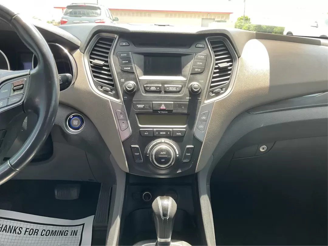 2014 Moonstone Silver Hyundai Santa Fe Sport 2.4 AWD (5XYZUDLB6EG) with an 2.4L L4 DOHC 16V engine, 6-Speed Automatic transmission, located at 8750 N County Rd 25A, Piqua, OH, 45356, (937) 908-9800, 40.164391, -84.232513 - **Adventure Awaits with the 2014 Hyundai Santa Fe Sport 2.4 AWD: Your Perfect Family Companion!** <br /> <br /> Are you searching for a vehicle that seamlessly blends versatility and reliability, ideal for everything from family road trips to daily commutes? Look no further! Advantage Car and Credit - Photo#11