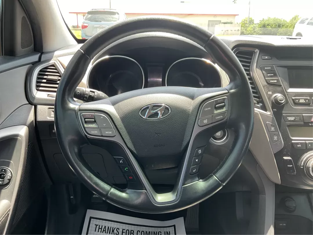 2014 Moonstone Silver Hyundai Santa Fe Sport 2.4 AWD (5XYZUDLB6EG) with an 2.4L L4 DOHC 16V engine, 6-Speed Automatic transmission, located at 8750 N County Rd 25A, Piqua, OH, 45356, (937) 908-9800, 40.164391, -84.232513 - **Adventure Awaits with the 2014 Hyundai Santa Fe Sport 2.4 AWD: Your Perfect Family Companion!** <br /> <br /> Are you searching for a vehicle that seamlessly blends versatility and reliability, ideal for everything from family road trips to daily commutes? Look no further! Advantage Car and Credit - Photo#14