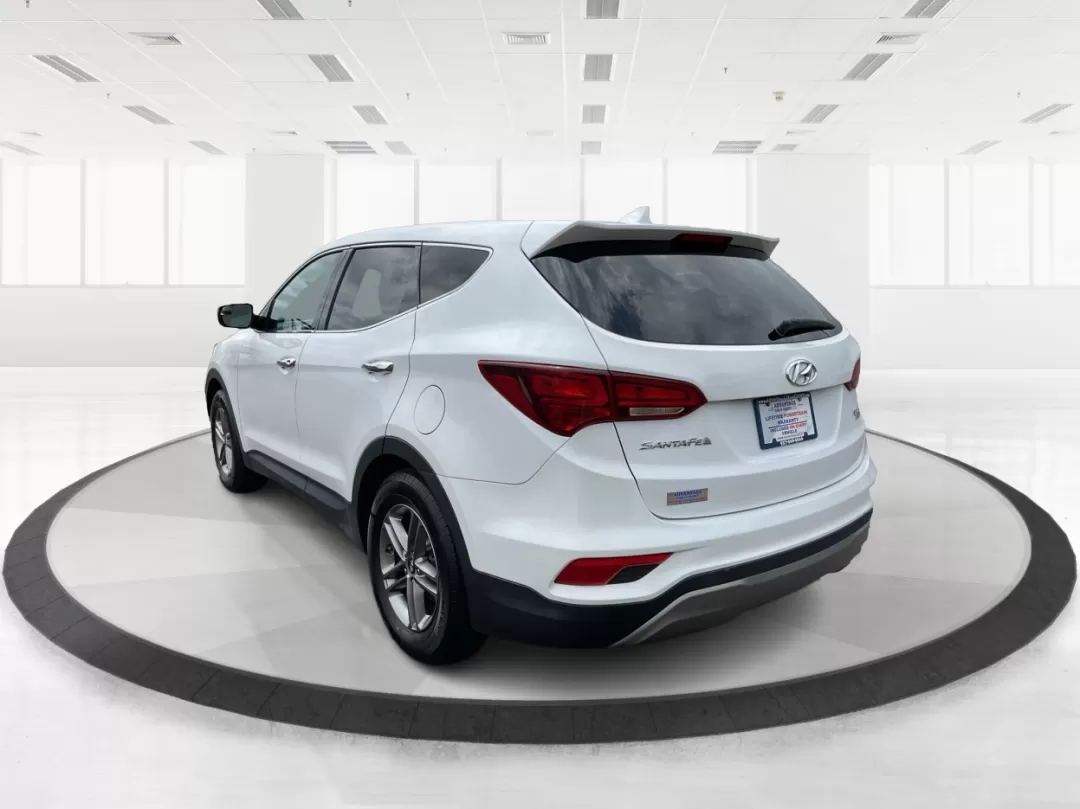 2017 Hyundai Santa Fe 2.4L (5NMZTDLB4HH) with an Theta II 2.4L I-4 gasoline direct injection engine, located at 880 E. National Road, Vandalia, OH, 45377, (937) 908-9800, 39.891918, -84.183594 - Photo#4