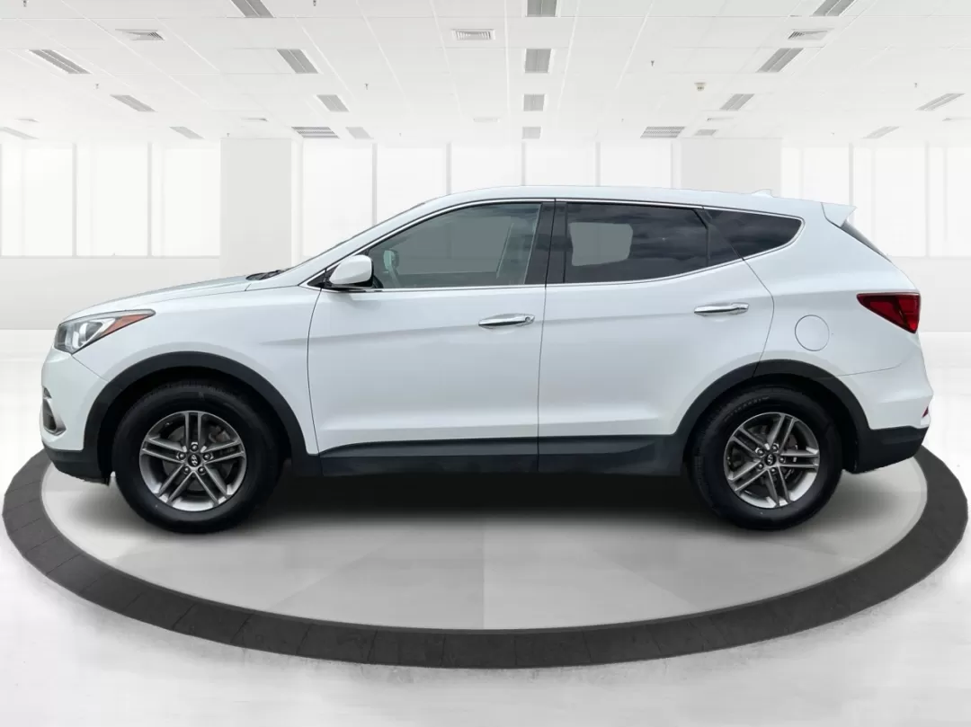 2017 Hyundai Santa Fe 2.4L (5NMZTDLB4HH) with an Theta II 2.4L I-4 gasoline direct injection engine, located at 880 E. National Road, Vandalia, OH, 45377, (937) 908-9800, 39.891918, -84.183594 - Photo#5