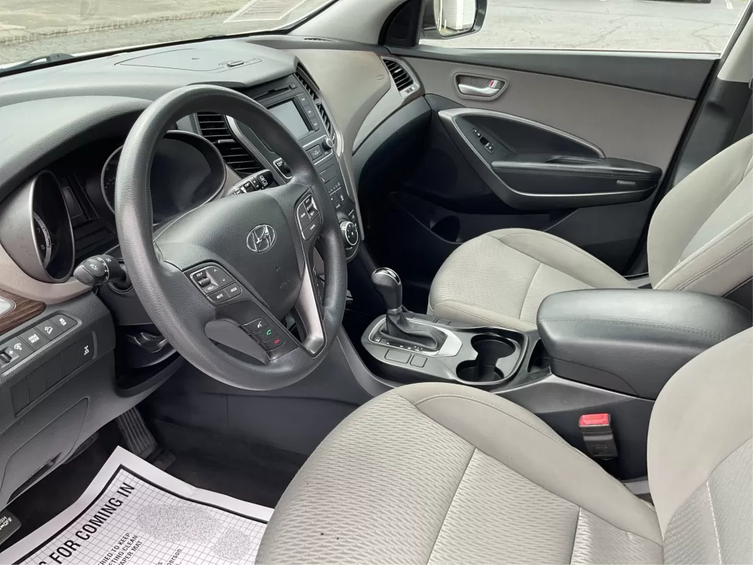 2017 Hyundai Santa Fe 2.4L (5NMZTDLB4HH) with an Theta II 2.4L I-4 gasoline direct injection engine, located at 880 E. National Road, Vandalia, OH, 45377, (937) 908-9800, 39.891918, -84.183594 - Photo#9
