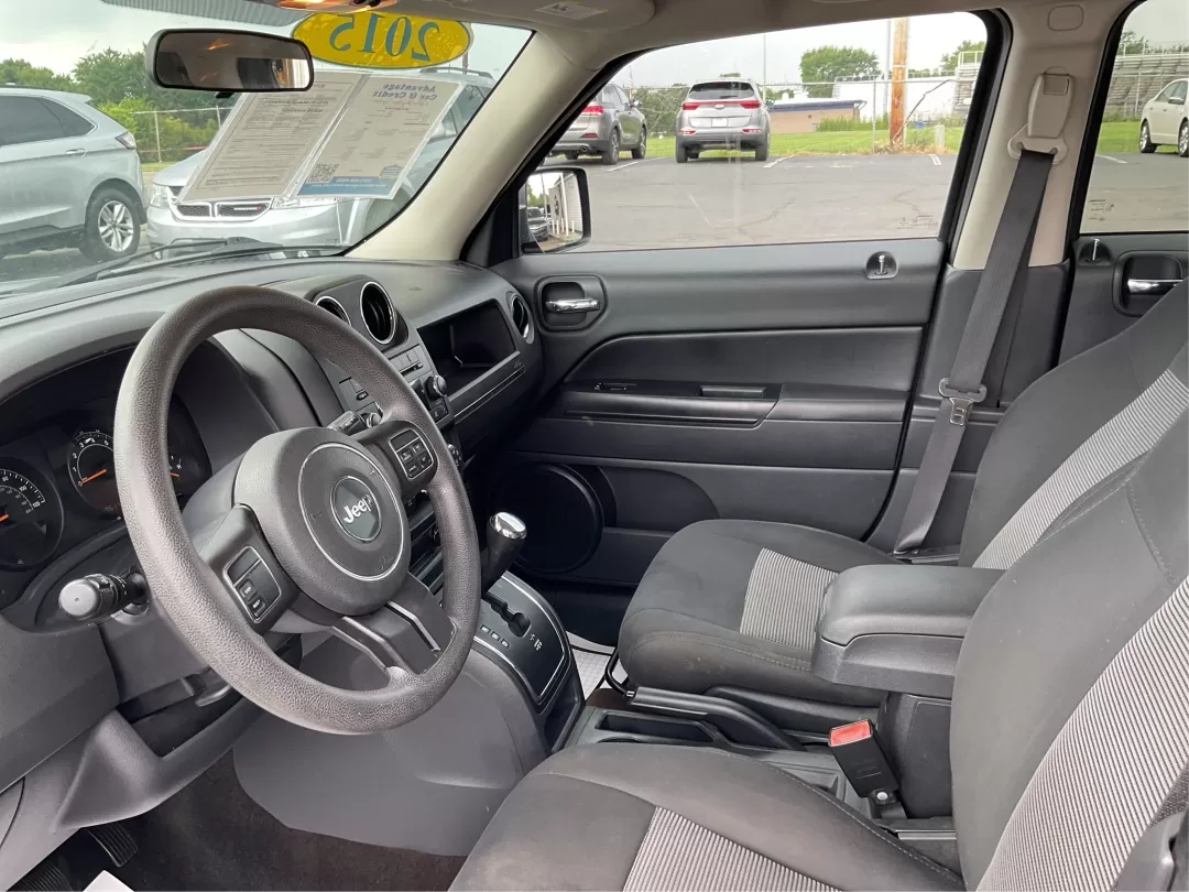 2015 Jeep Patriot Sport 2WD (1C4NJPBAXFD) with an 2.0L L4 DOHC 16V engine, located at 8750 N County Rd 25A, Piqua, OH, 45356, (937) 908-9800, 40.164391, -84.232513 - 2015 Jeep Patriot Sport 2WD - Photo#9
