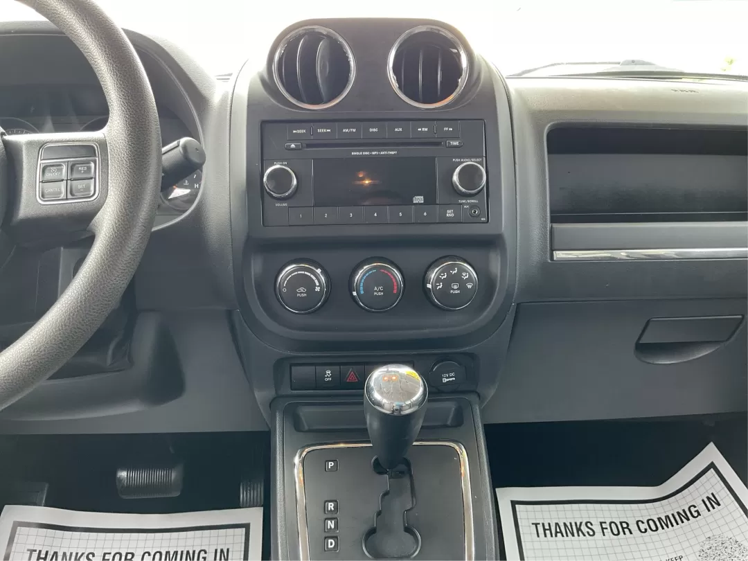 2015 Jeep Patriot Sport 2WD (1C4NJPBAXFD) with an 2.0L L4 DOHC 16V engine, located at 8750 N County Rd 25A, Piqua, OH, 45356, (937) 908-9800, 40.164391, -84.232513 - 2015 Jeep Patriot Sport 2WD - Photo#13