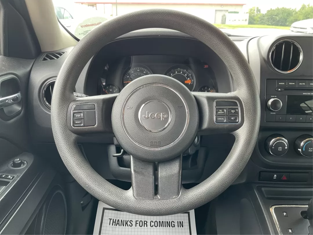 2015 Jeep Patriot Sport 2WD (1C4NJPBAXFD) with an 2.0L L4 DOHC 16V engine, located at 8750 N County Rd 25A, Piqua, OH, 45356, (937) 908-9800, 40.164391, -84.232513 - 2015 Jeep Patriot Sport 2WD - Photo#16