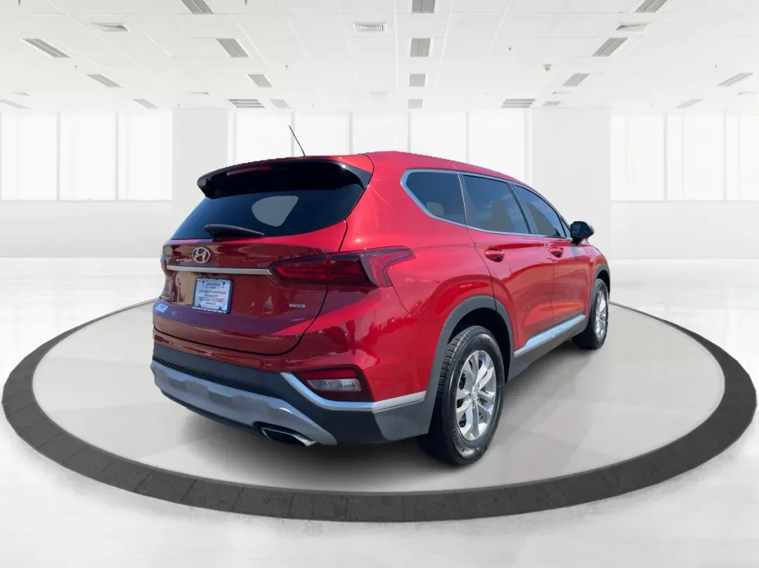 2019 Hyundai Santa Fe SE 2.4 AWD (5NMS2CAD9KH) with an 2.4L L4 DOHC 16V engine, 8-Speed Automatic transmission, located at 8750 N County Rd 25A, Piqua, OH, 45356, (937) 908-9800, 40.164391, -84.232513 - Photo#2