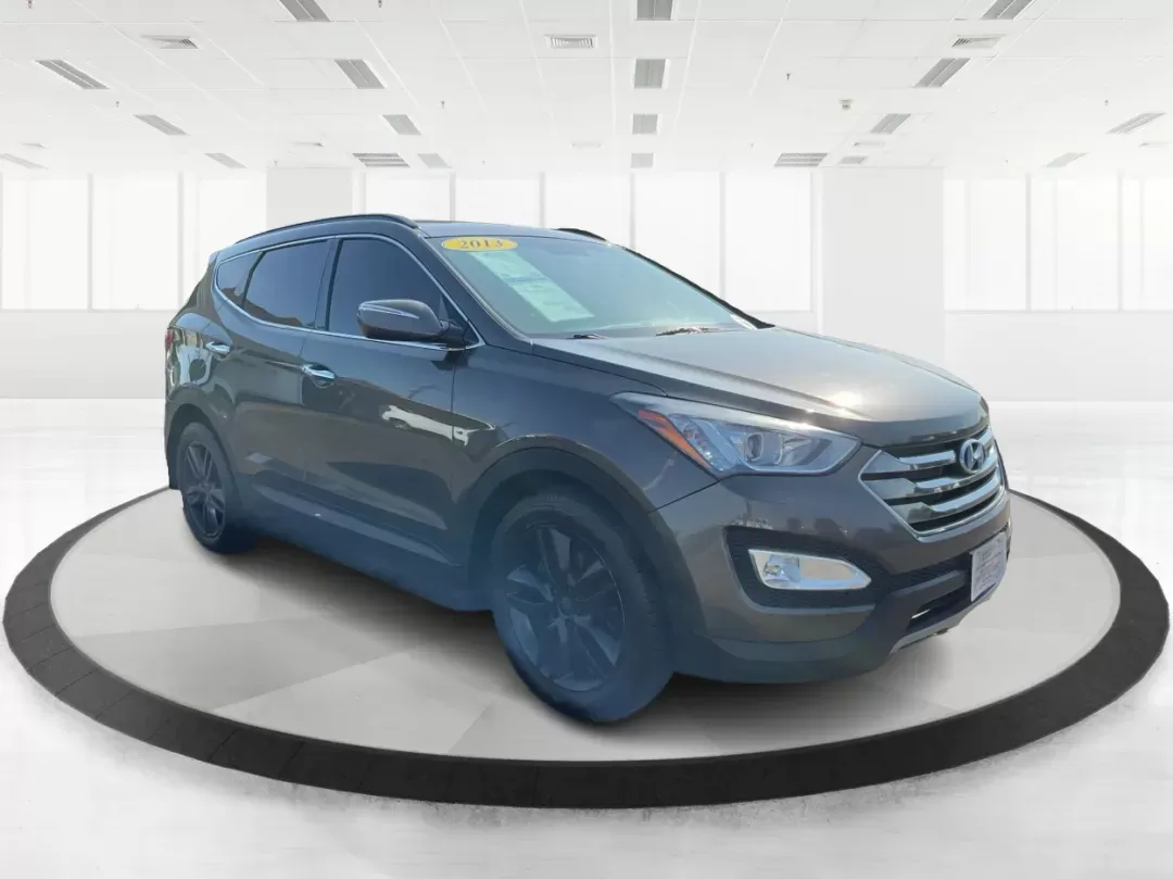 2013 Hyundai Santa Fe Sport 2.0 AWD (5XYZUDLA2DG) with an 2.0L L4 DOHC 16V engine, 6-Speed Automatic transmission, located at 1099 N County Rd 25A , Troy, OH, 45373, (937) 908-9800, 40.057079, -84.212883 - Photo#0