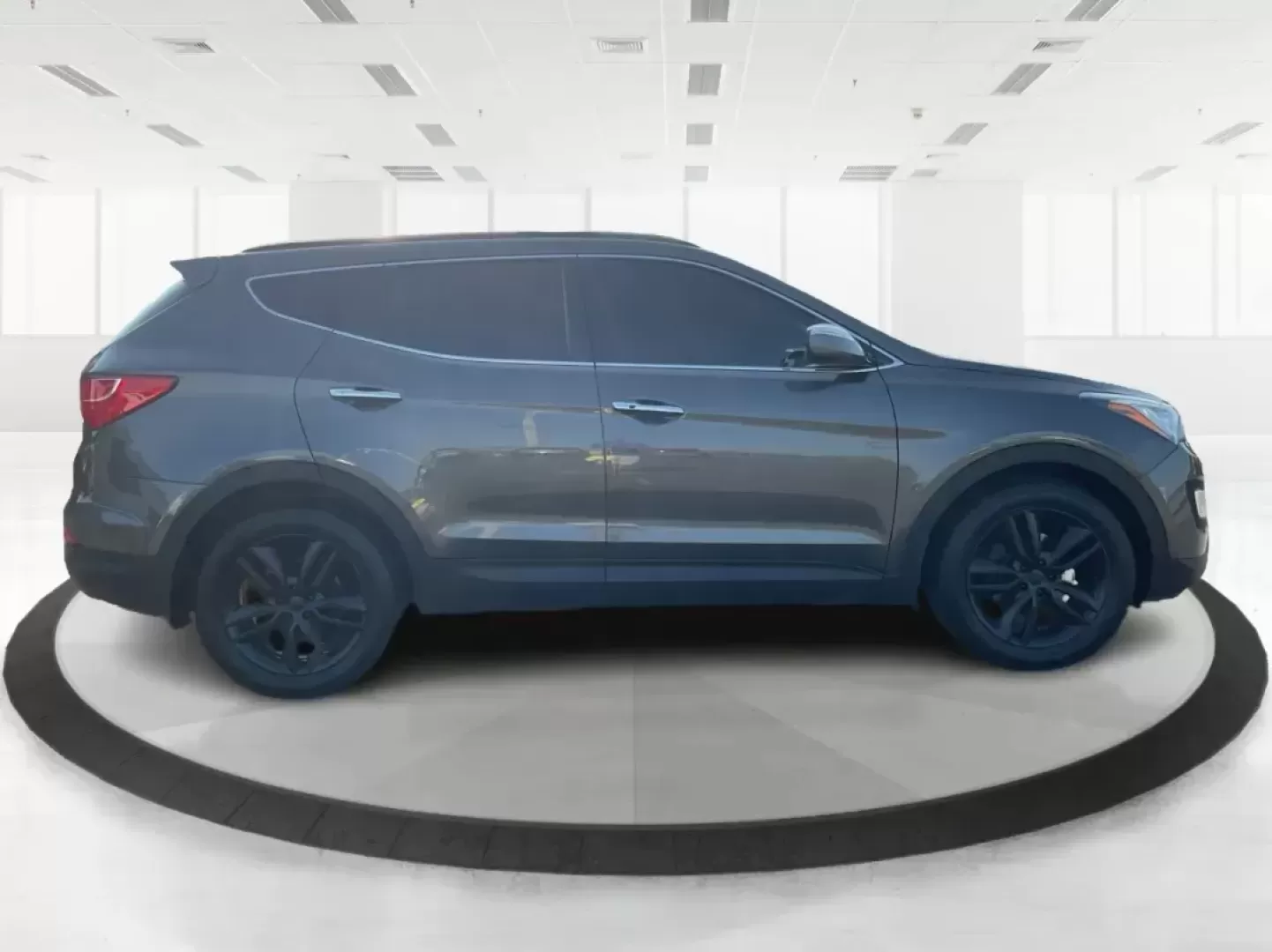 2013 Hyundai Santa Fe Sport 2.0 AWD (5XYZUDLA2DG) with an 2.0L L4 DOHC 16V engine, 6-Speed Automatic transmission, located at 1099 N County Rd 25A, Troy, OH, 45373, (937) 908-9800, 40.057079, -84.212883 - Photo#1