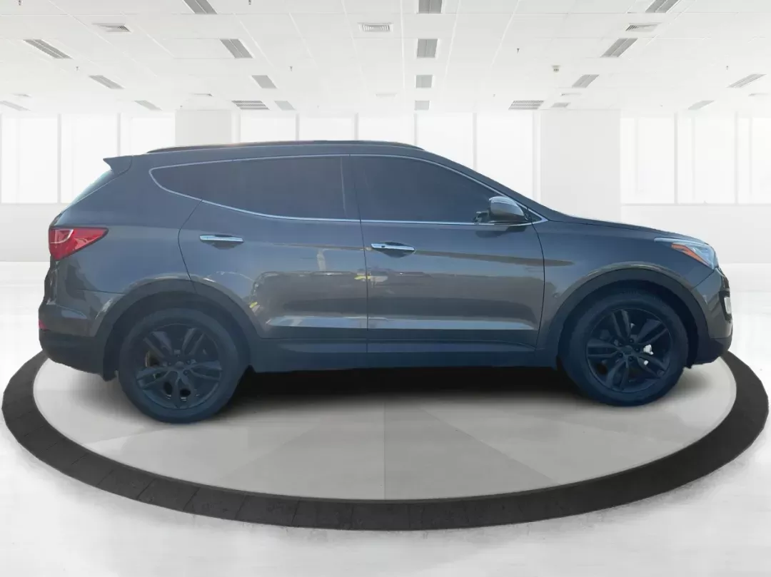 2013 Hyundai Santa Fe Sport 2.0 AWD (5XYZUDLA2DG) with an 2.0L L4 DOHC 16V engine, 6-Speed Automatic transmission, located at 1099 N County Rd 25A , Troy, OH, 45373, (937) 908-9800, 40.057079, -84.212883 - Photo#1