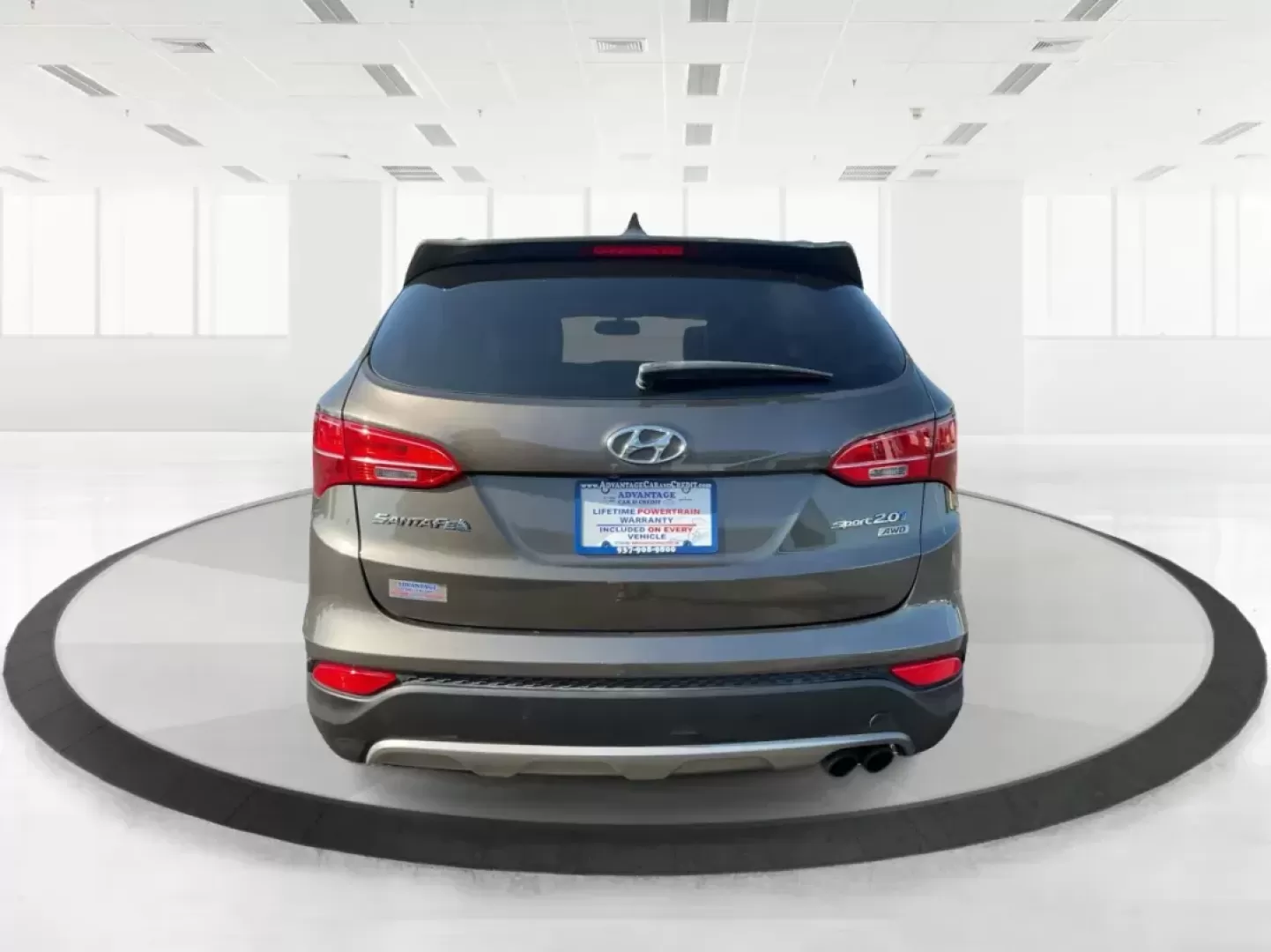 2013 Hyundai Santa Fe Sport 2.0 AWD (5XYZUDLA2DG) with an 2.0L L4 DOHC 16V engine, 6-Speed Automatic transmission, located at 1099 N County Rd 25A, Troy, OH, 45373, (937) 908-9800, 40.057079, -84.212883 - Photo#3