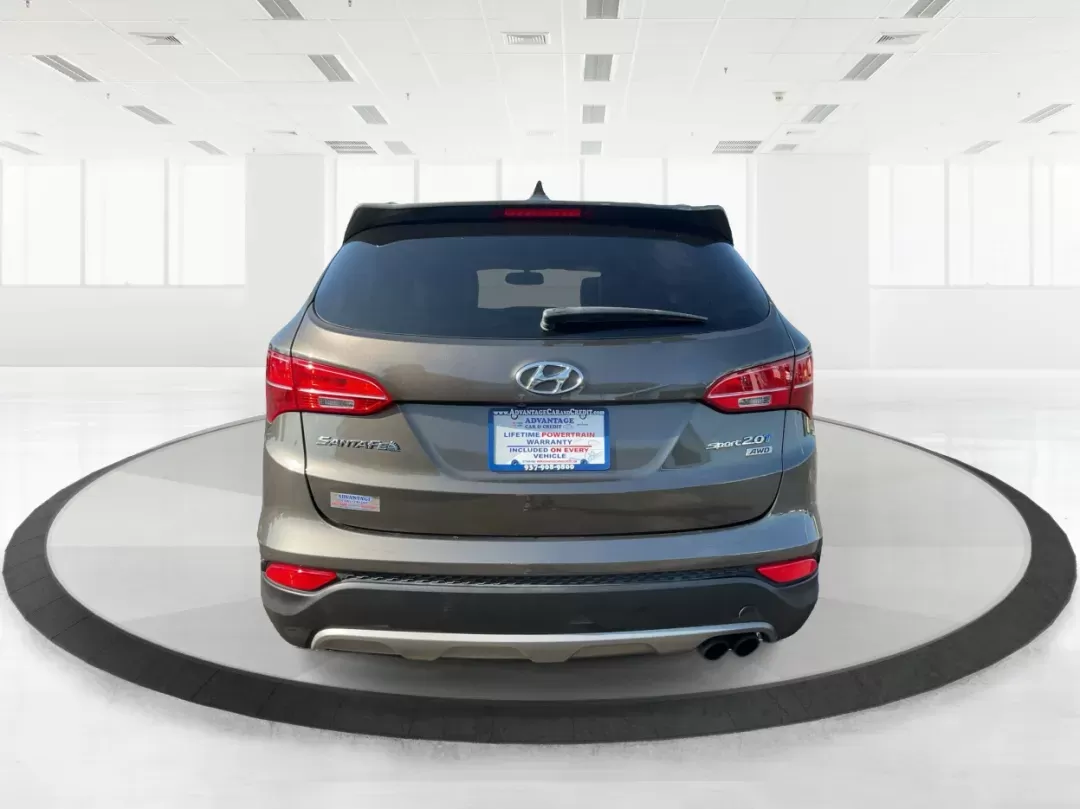 2013 Hyundai Santa Fe Sport 2.0 AWD (5XYZUDLA2DG) with an 2.0L L4 DOHC 16V engine, 6-Speed Automatic transmission, located at 1099 N County Rd 25A , Troy, OH, 45373, (937) 908-9800, 40.057079, -84.212883 - Photo#3