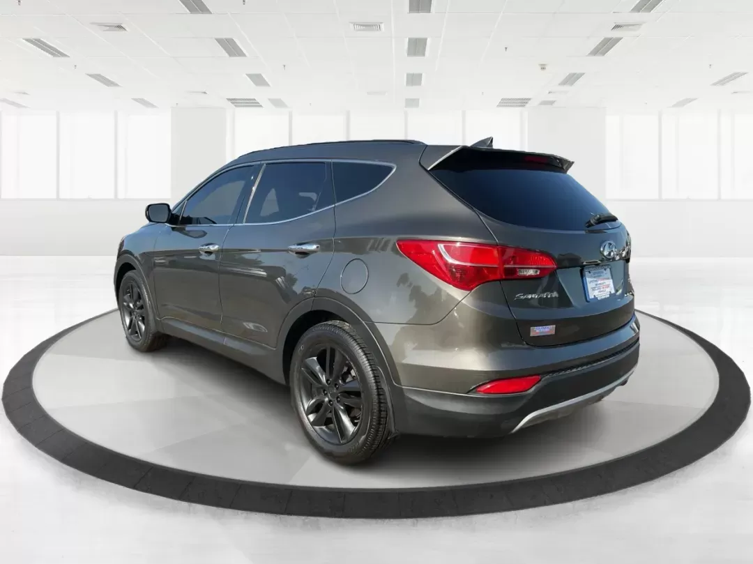 2013 Hyundai Santa Fe Sport 2.0 AWD (5XYZUDLA2DG) with an 2.0L L4 DOHC 16V engine, 6-Speed Automatic transmission, located at 1099 N County Rd 25A , Troy, OH, 45373, (937) 908-9800, 40.057079, -84.212883 - Photo#4