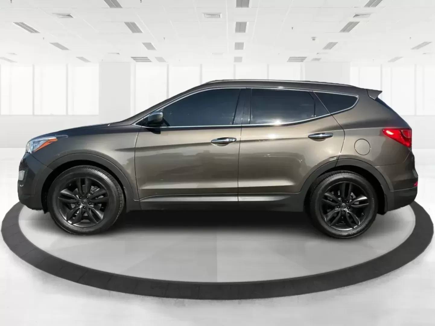 2013 Hyundai Santa Fe Sport 2.0 AWD (5XYZUDLA2DG) with an 2.0L L4 DOHC 16V engine, 6-Speed Automatic transmission, located at 1099 N County Rd 25A, Troy, OH, 45373, (937) 908-9800, 40.057079, -84.212883 - Photo#5