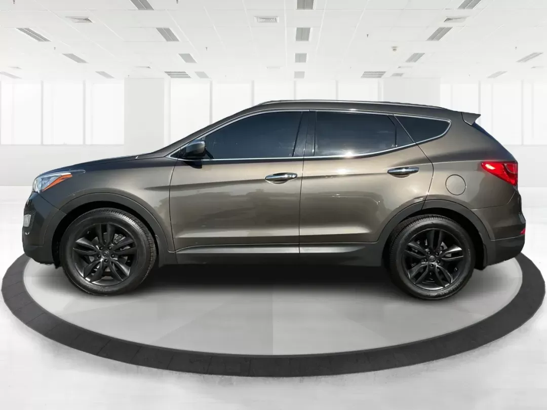 2013 Hyundai Santa Fe Sport 2.0 AWD (5XYZUDLA2DG) with an 2.0L L4 DOHC 16V engine, 6-Speed Automatic transmission, located at 1099 N County Rd 25A , Troy, OH, 45373, (937) 908-9800, 40.057079, -84.212883 - Photo#5