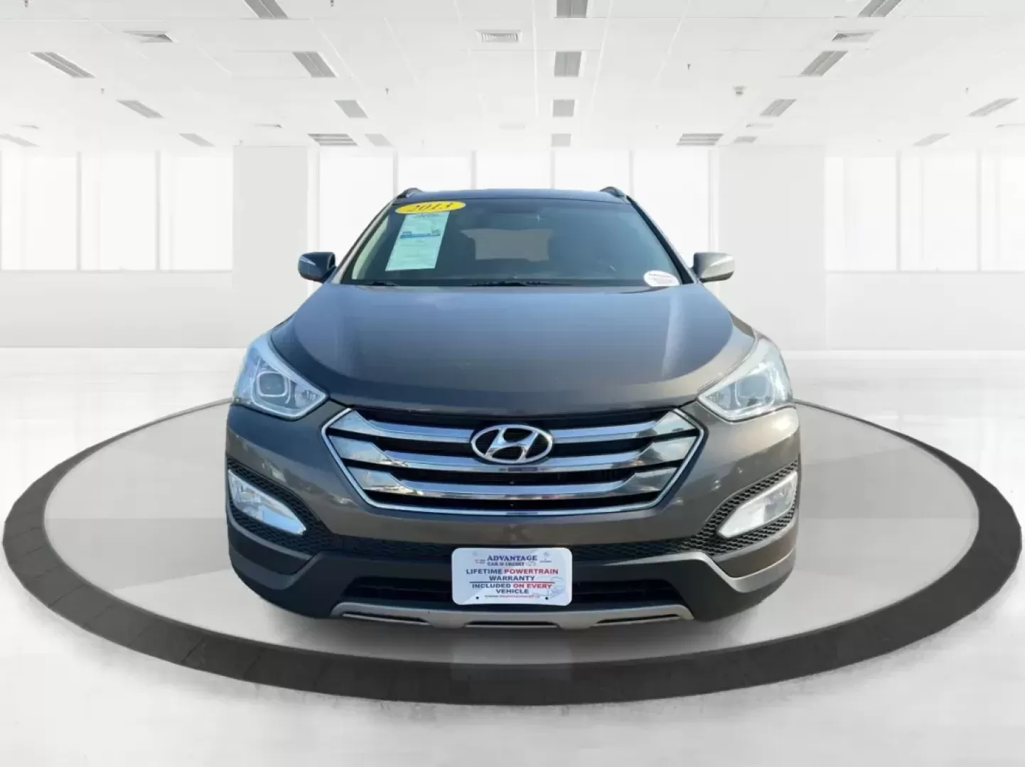 2013 Hyundai Santa Fe Sport 2.0 AWD (5XYZUDLA2DG) with an 2.0L L4 DOHC 16V engine, 6-Speed Automatic transmission, located at 1099 N County Rd 25A, Troy, OH, 45373, (937) 908-9800, 40.057079, -84.212883 - Photo#6