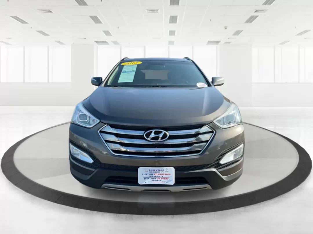 2013 Hyundai Santa Fe Sport 2.0 AWD (5XYZUDLA2DG) with an 2.0L L4 DOHC 16V engine, 6-Speed Automatic transmission, located at 1099 N County Rd 25A , Troy, OH, 45373, (937) 908-9800, 40.057079, -84.212883 - Photo#6
