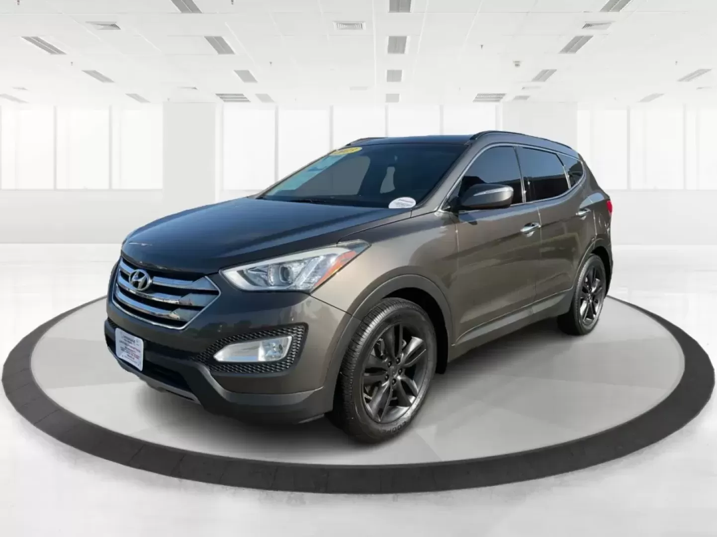 2013 Hyundai Santa Fe Sport 2.0 AWD (5XYZUDLA2DG) with an 2.0L L4 DOHC 16V engine, 6-Speed Automatic transmission, located at 1099 N County Rd 25A, Troy, OH, 45373, (937) 908-9800, 40.057079, -84.212883 - Photo#7